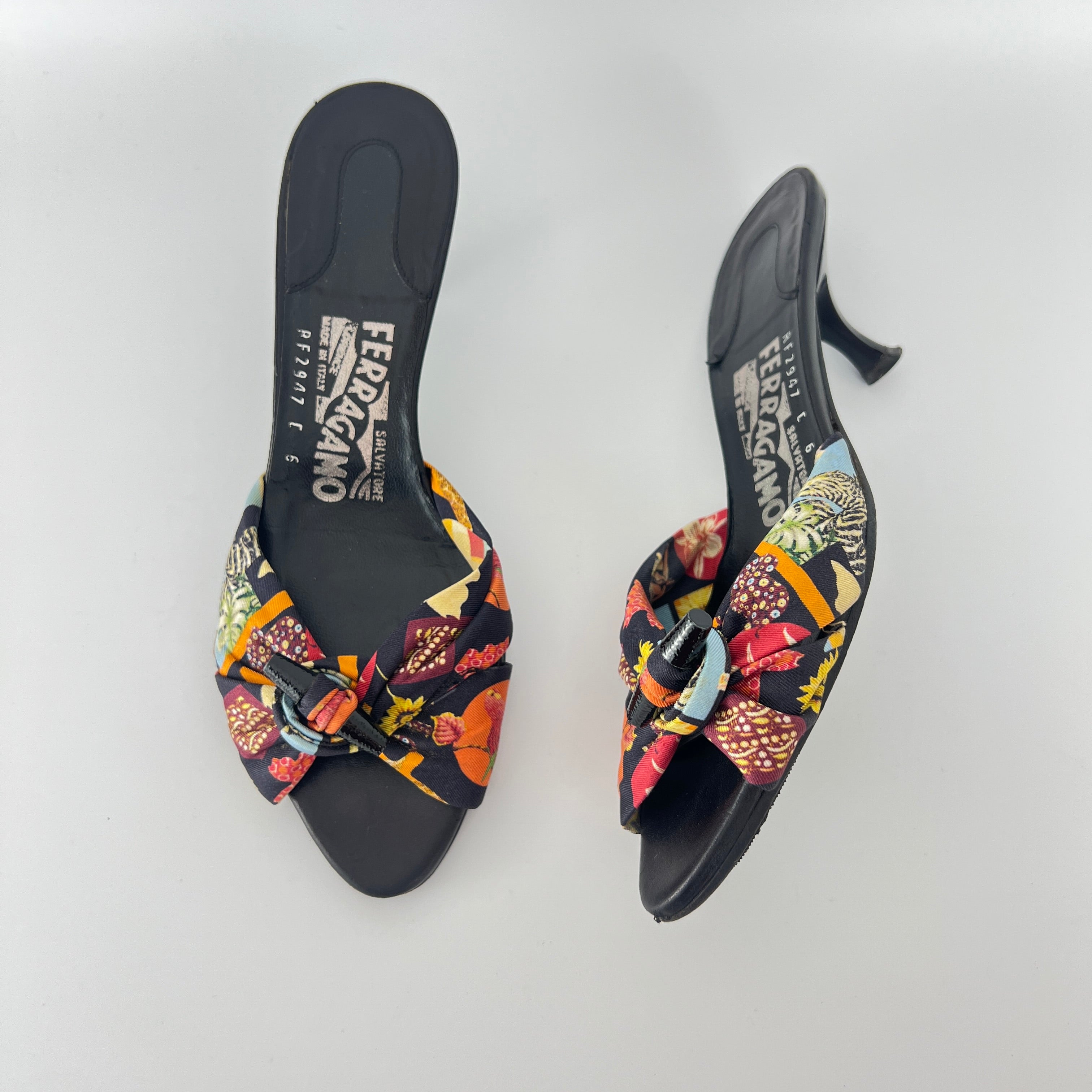 Ferragamo | Tropical Pattern Fabric Twist Button Black Slide Mules (6 , 36)
