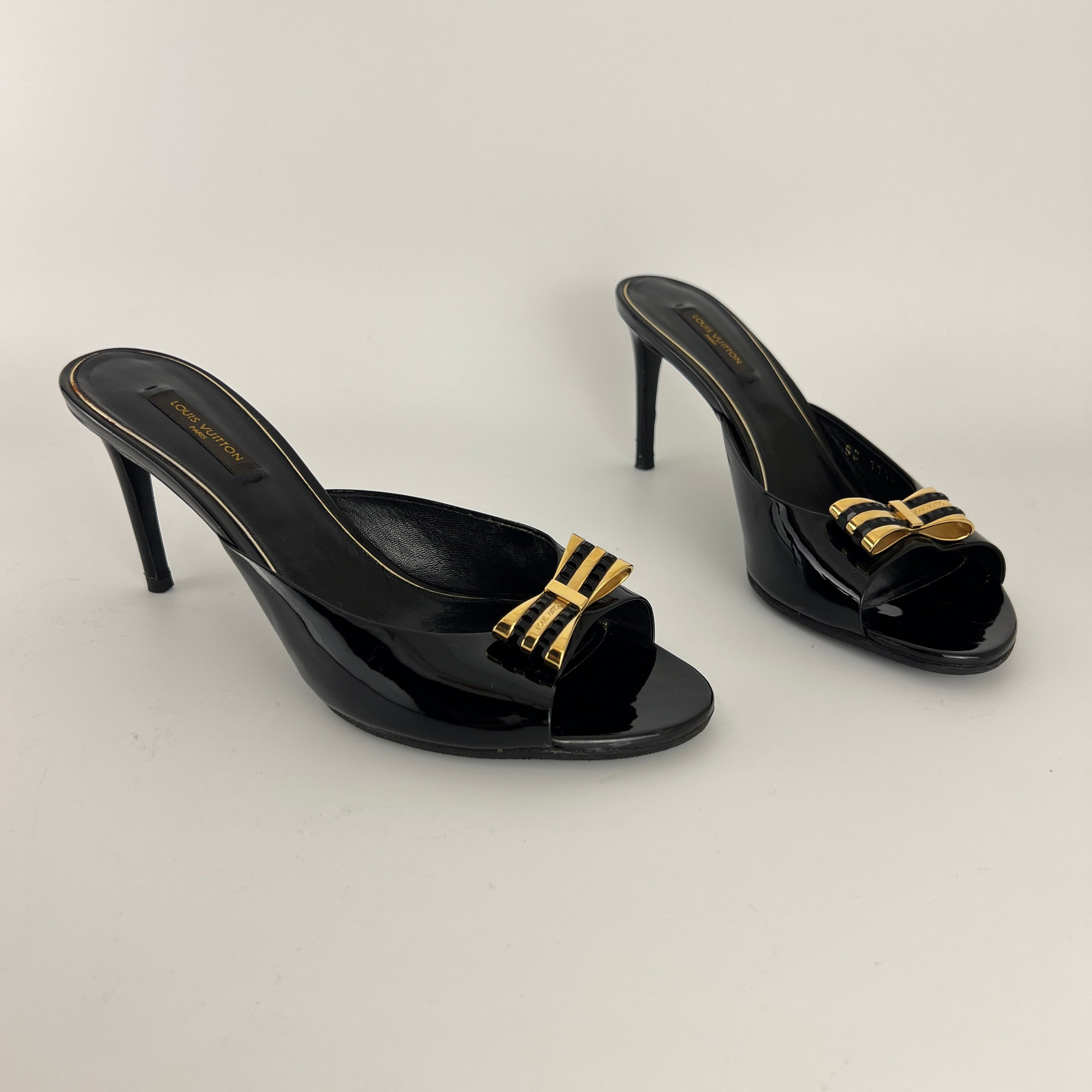 Louis Vuitton | Black Patent Leather Gold Gem Metal Bow Slide Mules (38)