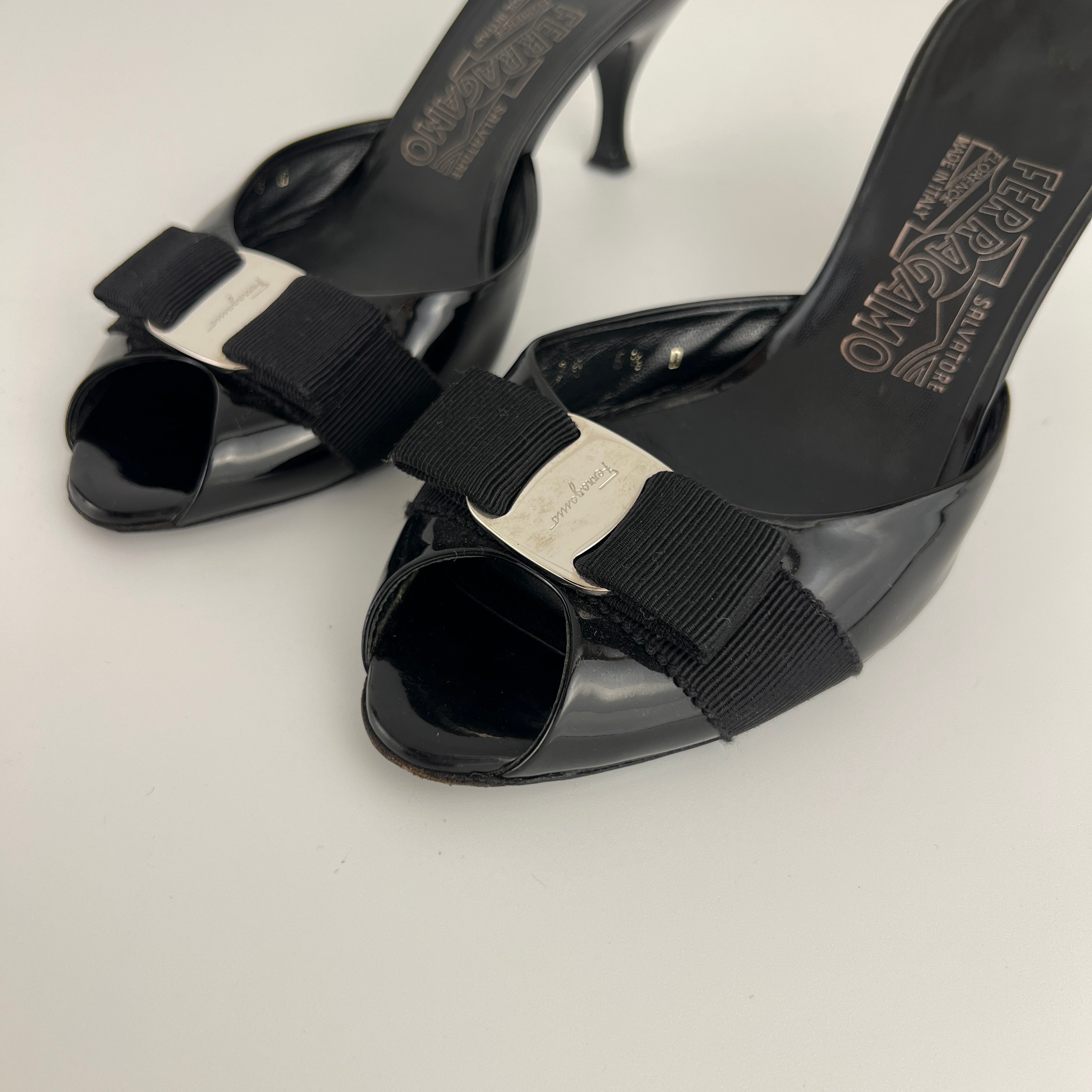 Ferragamo | Vara Bow Black Patent Leather Peep Toe Slide Mules (37 , 7)