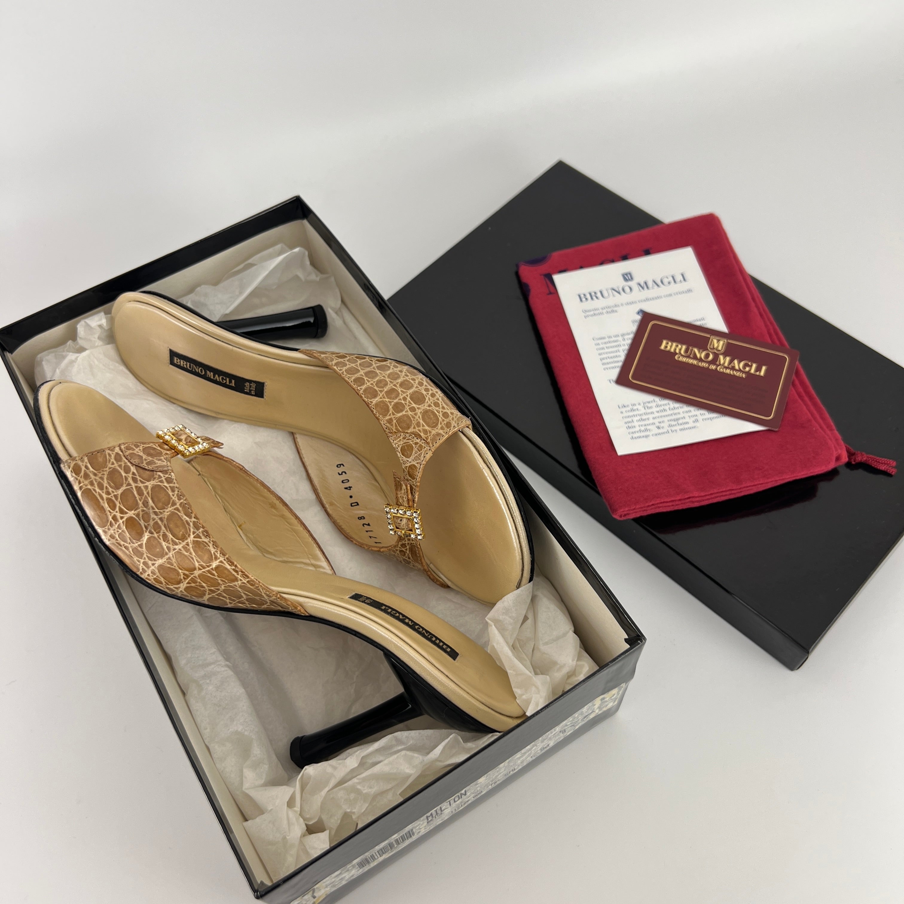Bruno Magli | Rhinestone Buckle Creme Animal Print Embossed Mules (37)