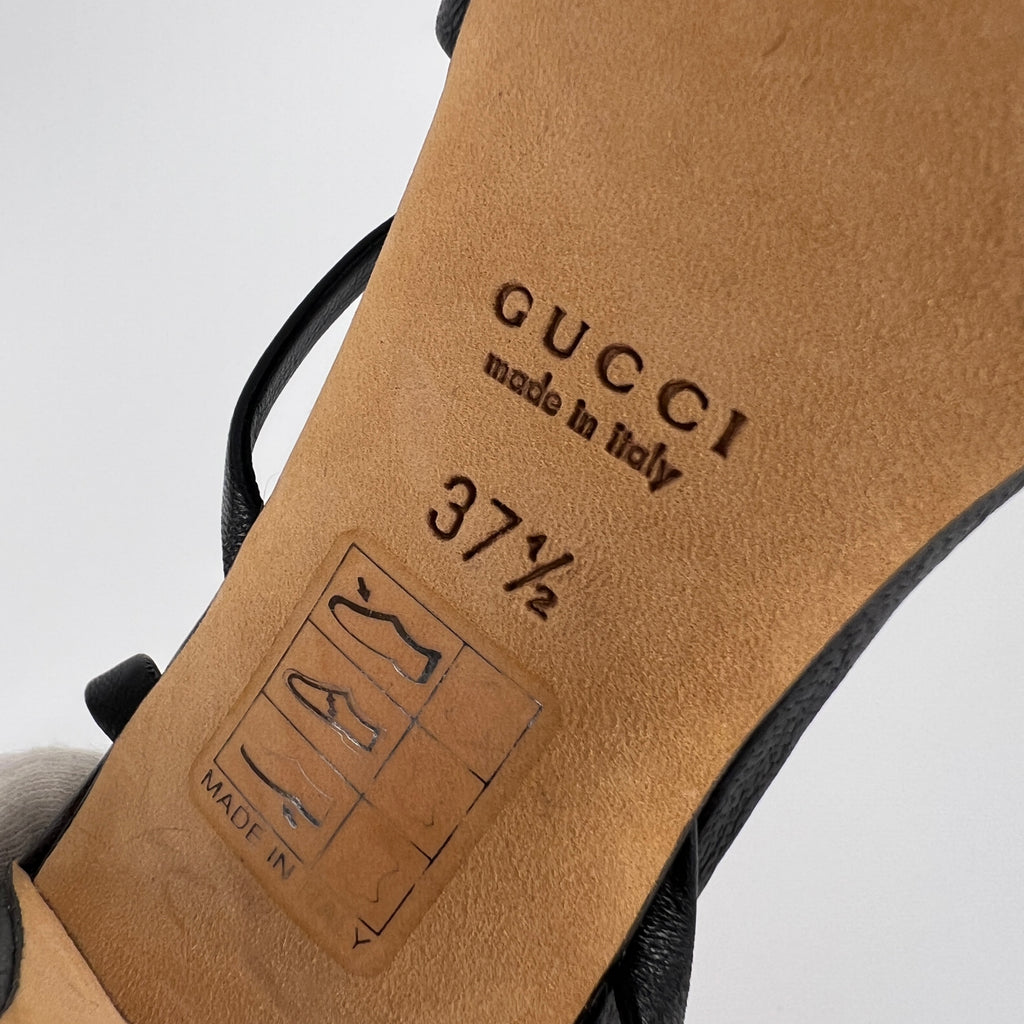 Gucci | GG Logo Silver Hardware Black Leather Metallic Insole Strappy Heels (37.5)