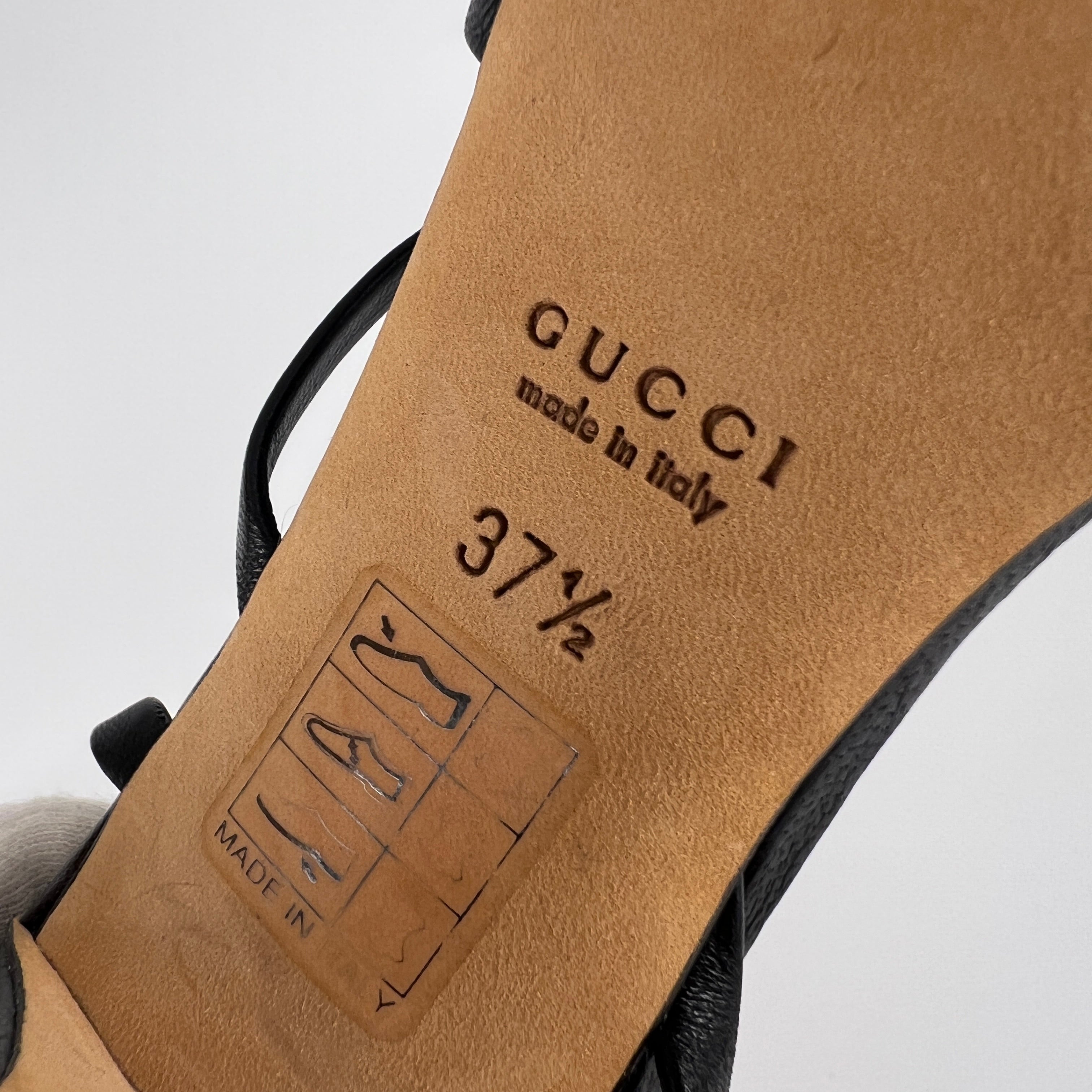 Gucci | GG Logo Silver Hardware Black Leather Metallic Insole Strappy Heels (37.5)