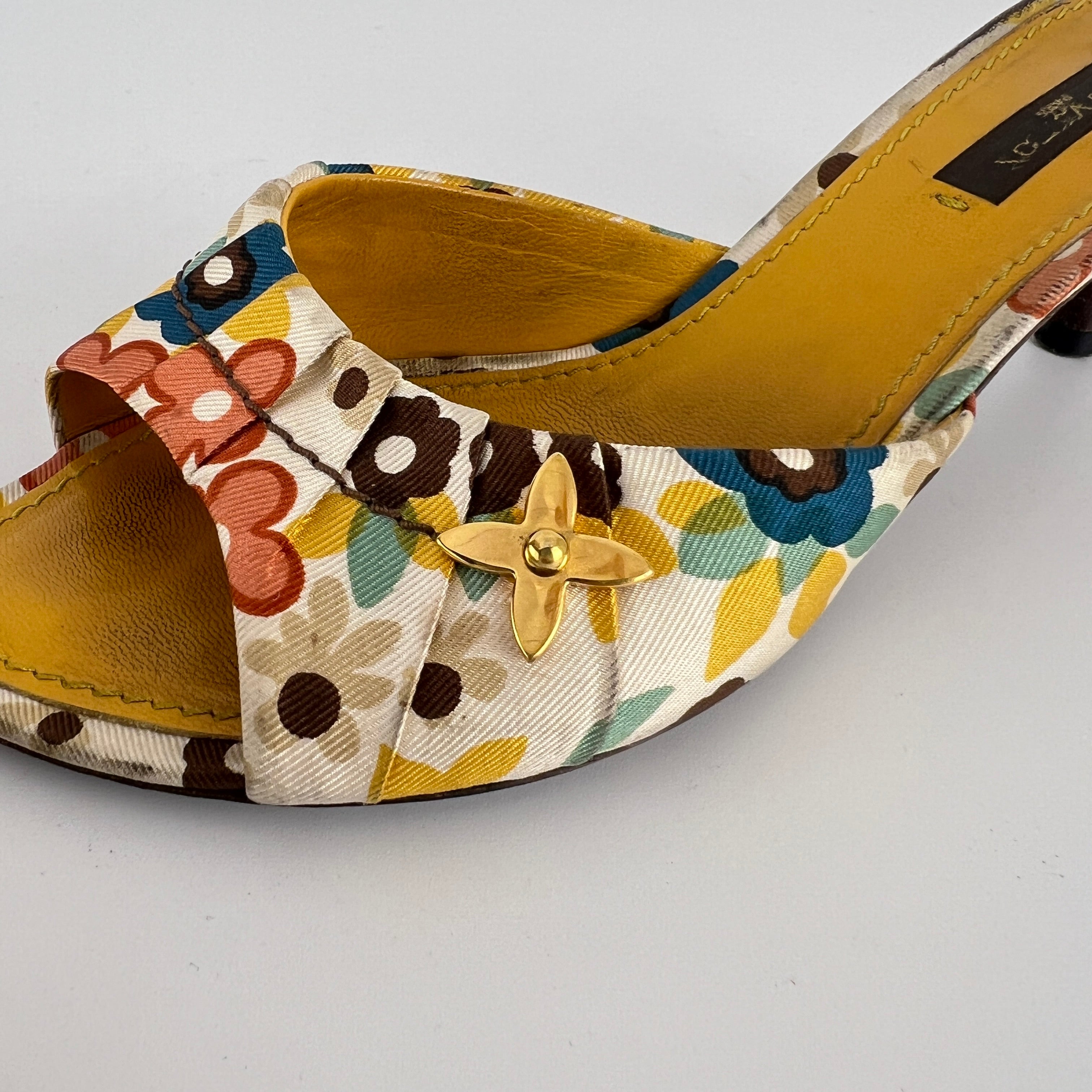 Louis Vuitton | Floral Gold Hardware Logo Kitten Heel Mules (36.5)