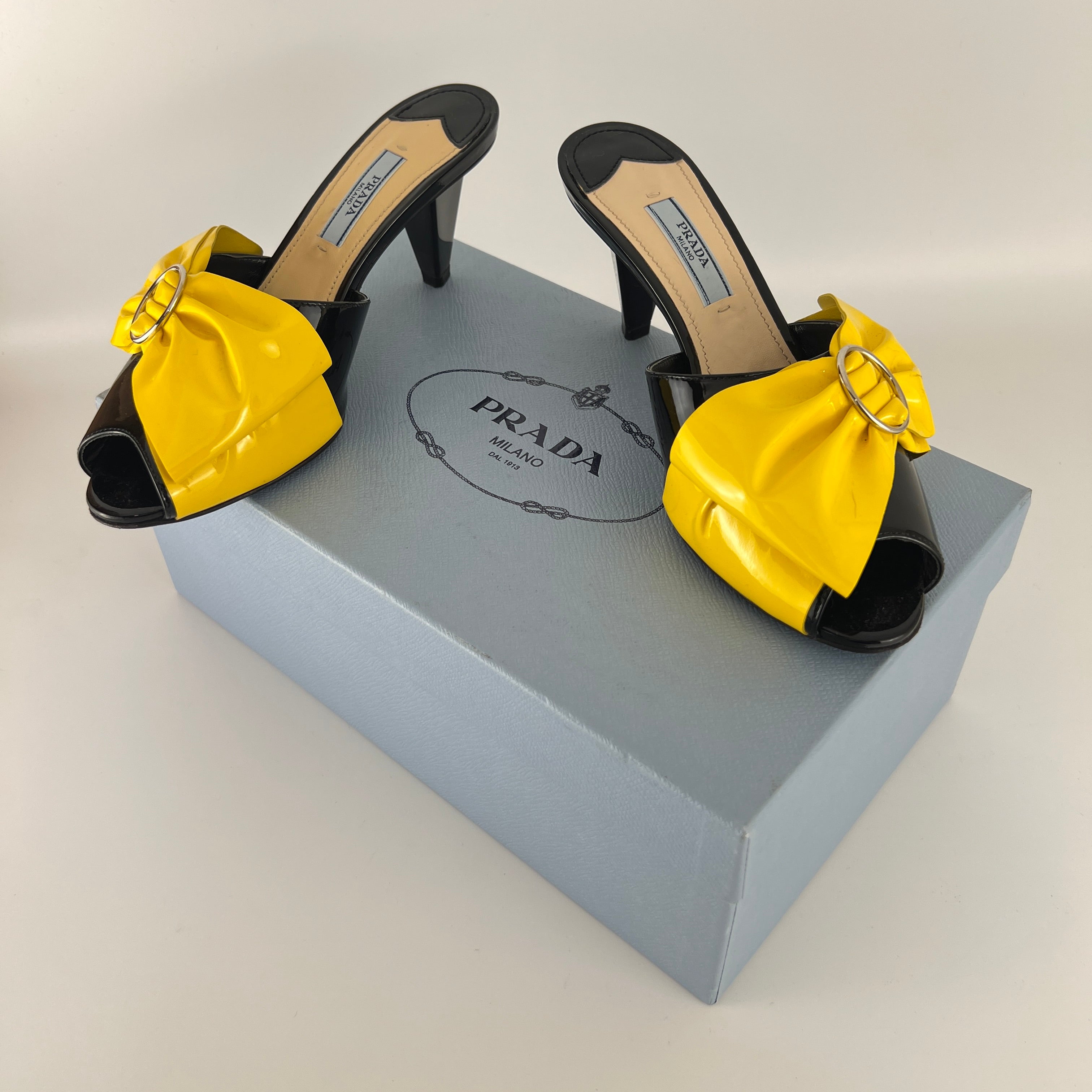 Prada | Yellow Knot Black Patent Leather Mid Heel Mules (36)