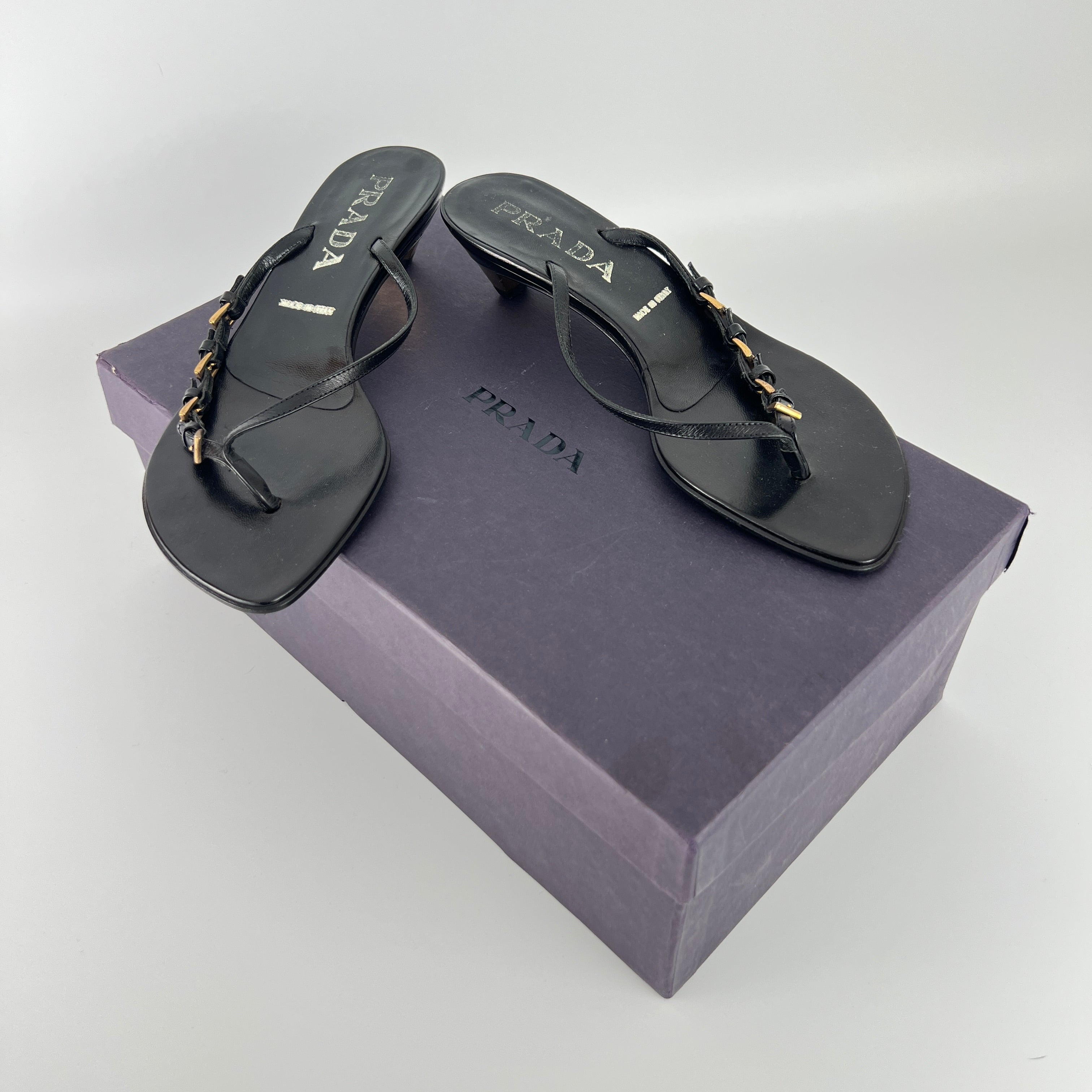 Prada | Vintage Black Leather Gold Buckle Thong Kitten Heels (34.5)