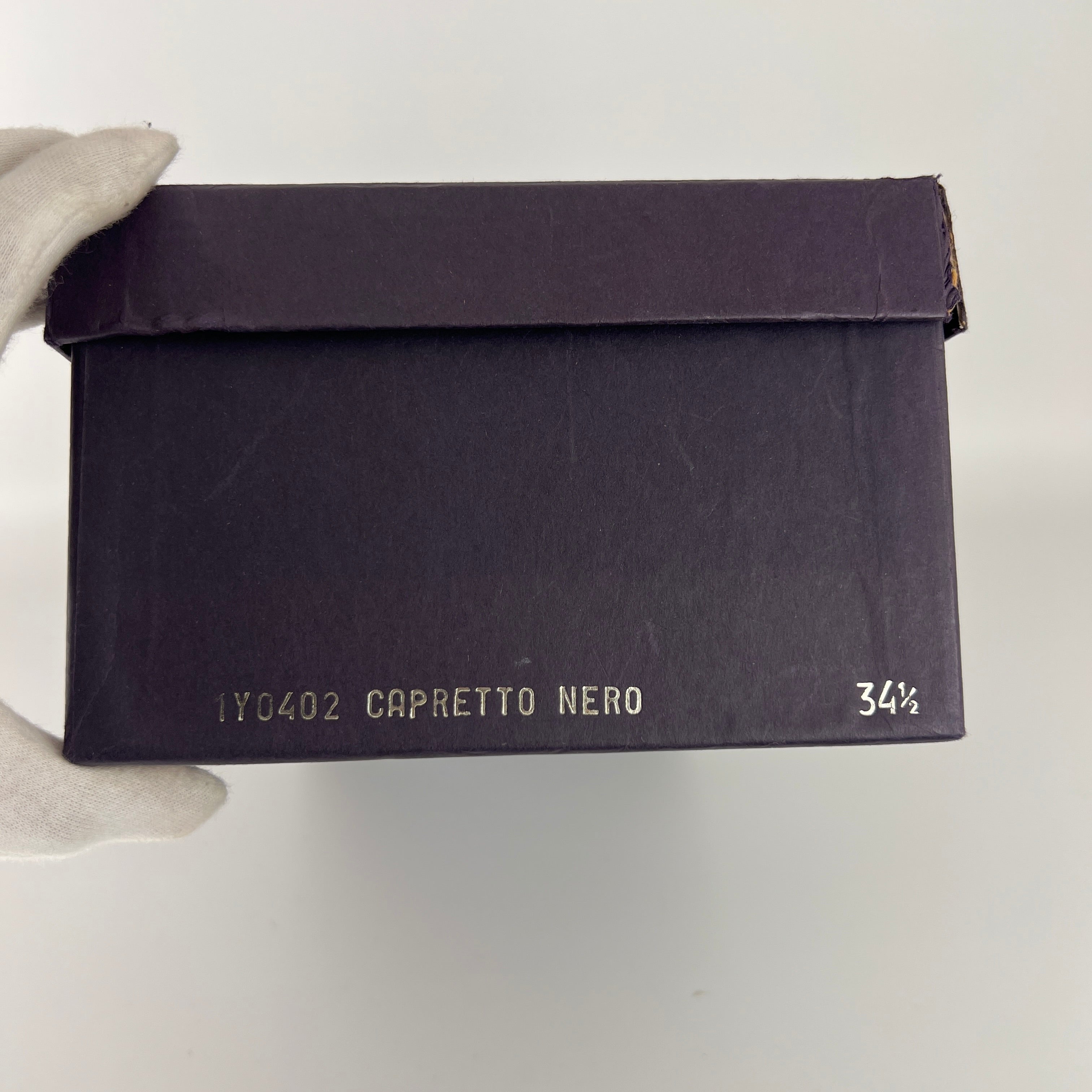 Prada | Vintage Black Leather Gold Buckle Thong Kitten Heels (34.5)