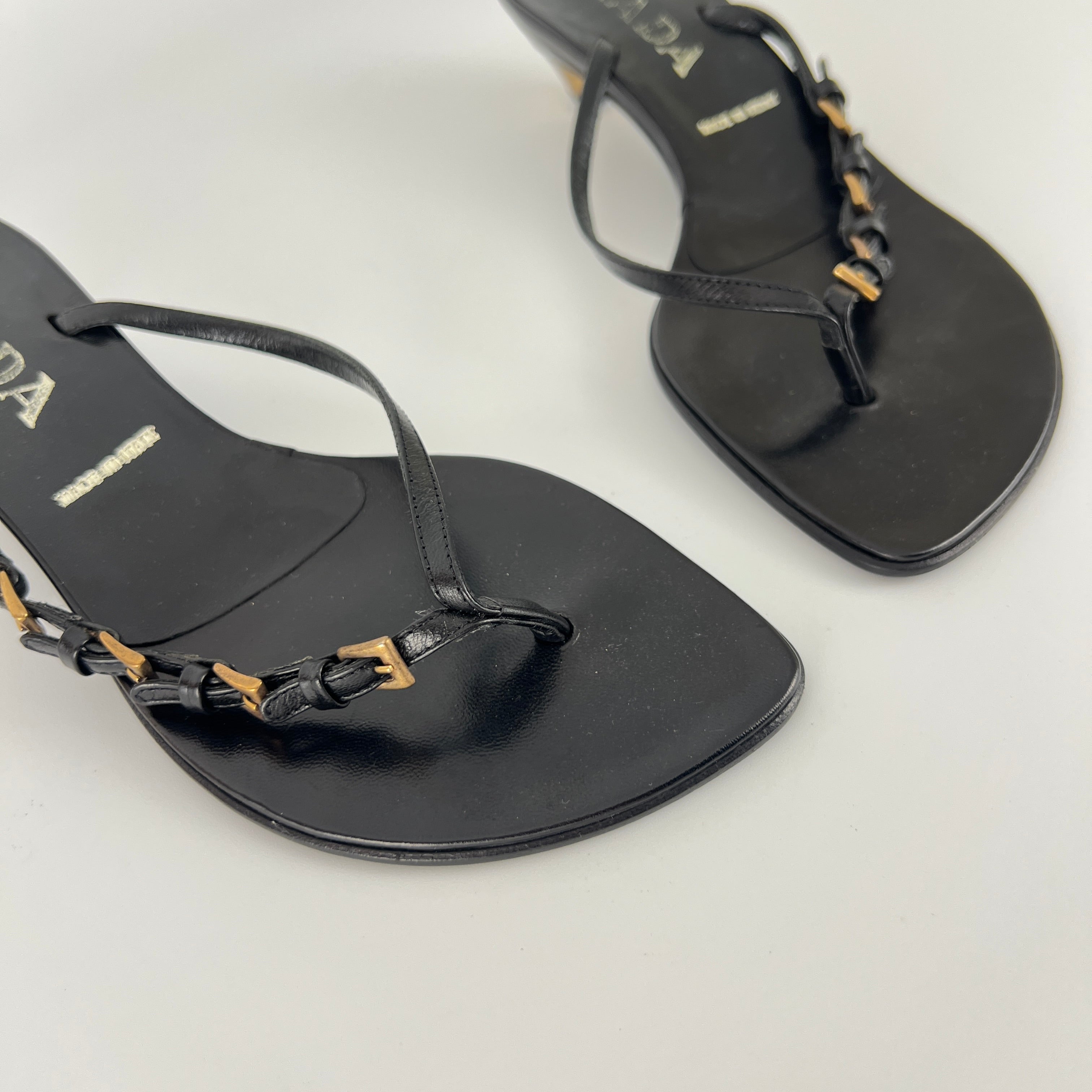 Prada | Vintage Black Leather Gold Buckle Thong Kitten Heels (34.5)