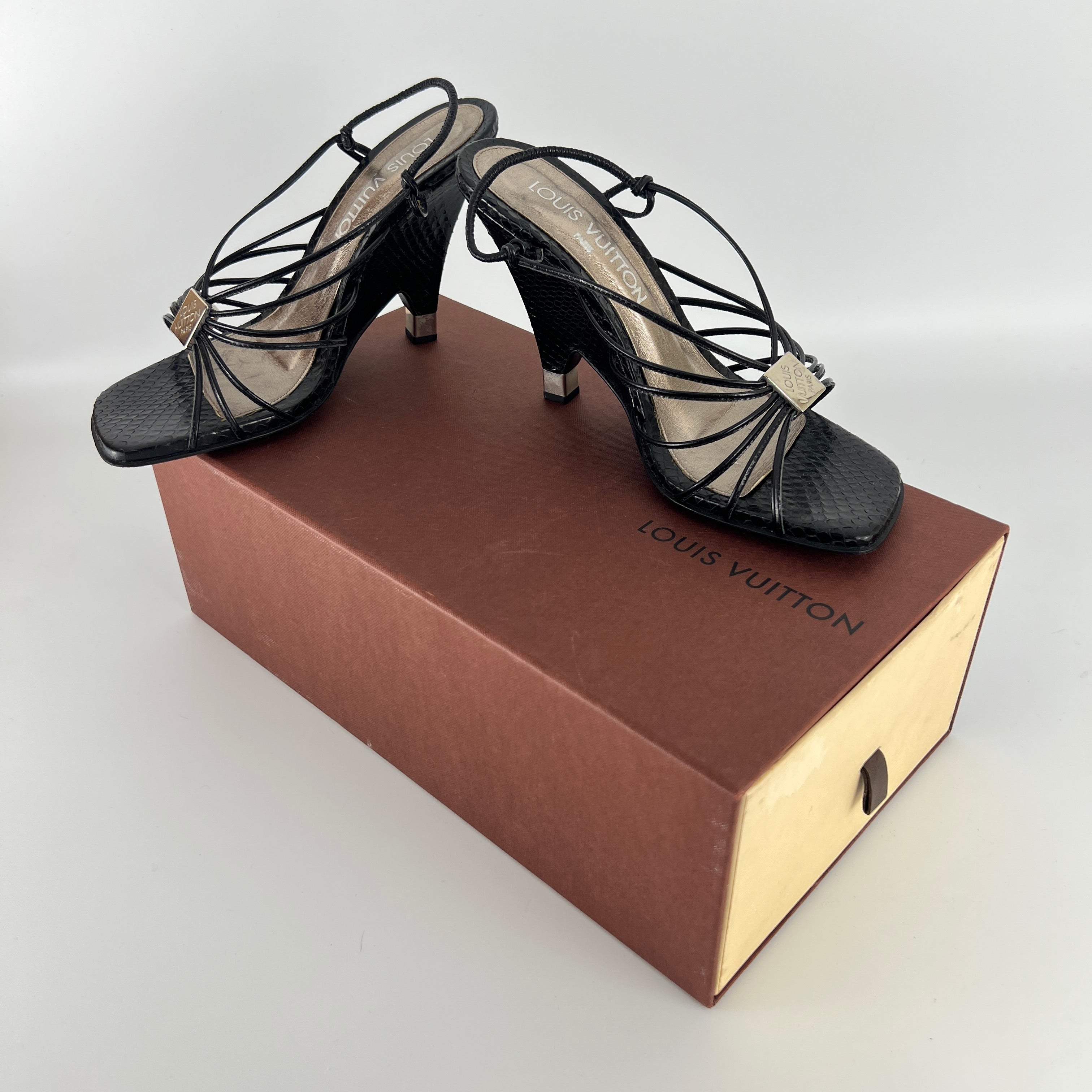Louis Vuitton | Black Exotic Leather Silver Logo Plate Strappy Wedge Heels (37)