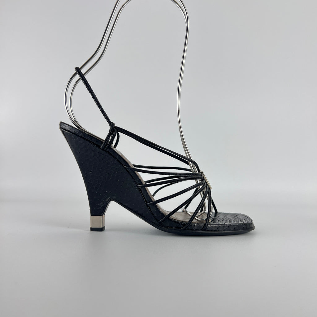Louis Vuitton | Black Exotic Leather Silver Logo Plate Strappy Wedge Heels (37)