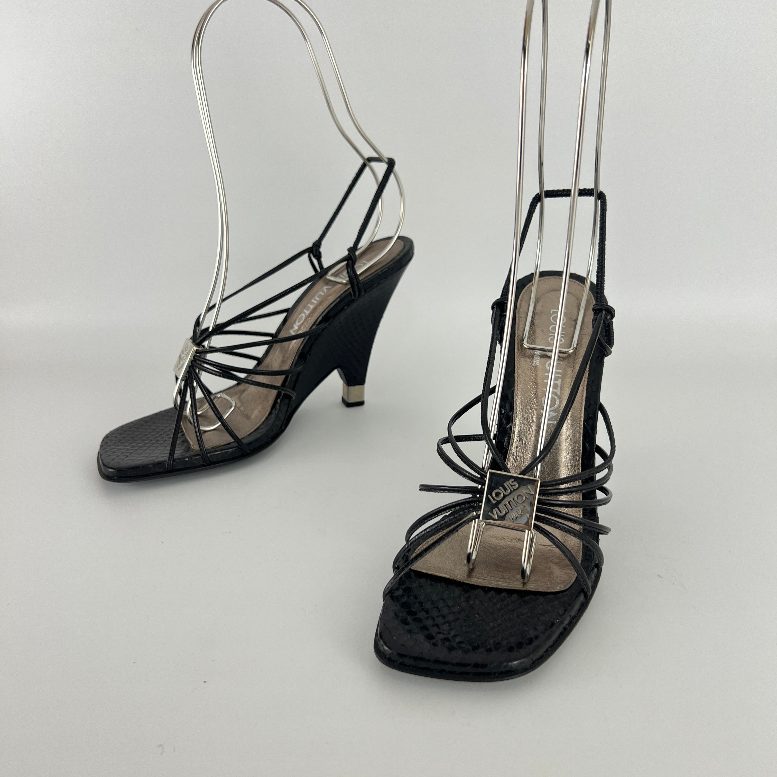 Louis Vuitton | Black Exotic Leather Silver Logo Plate Strappy Wedge Heels (37)