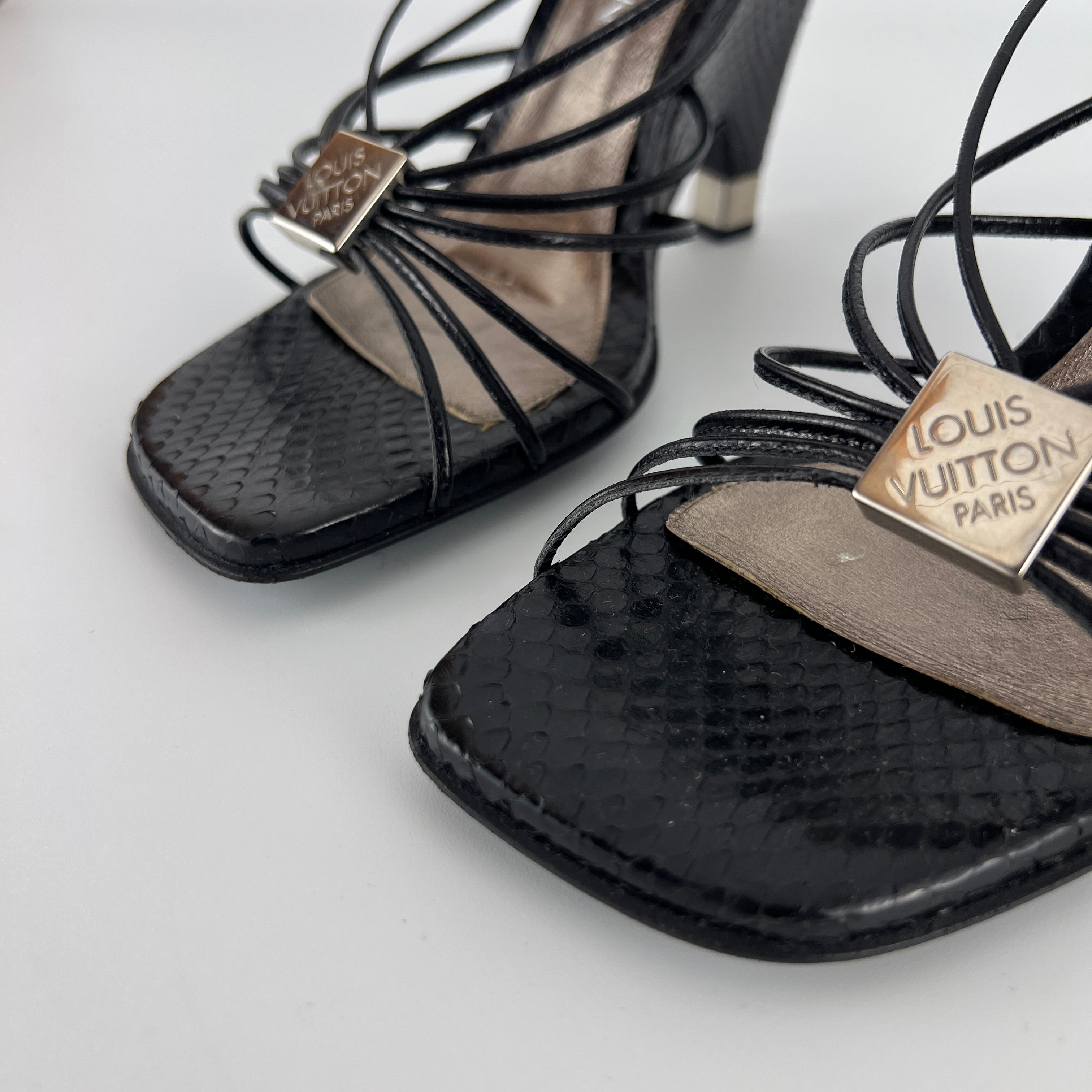 Louis Vuitton | Black Exotic Leather Silver Logo Plate Strappy Wedge Heels (37)