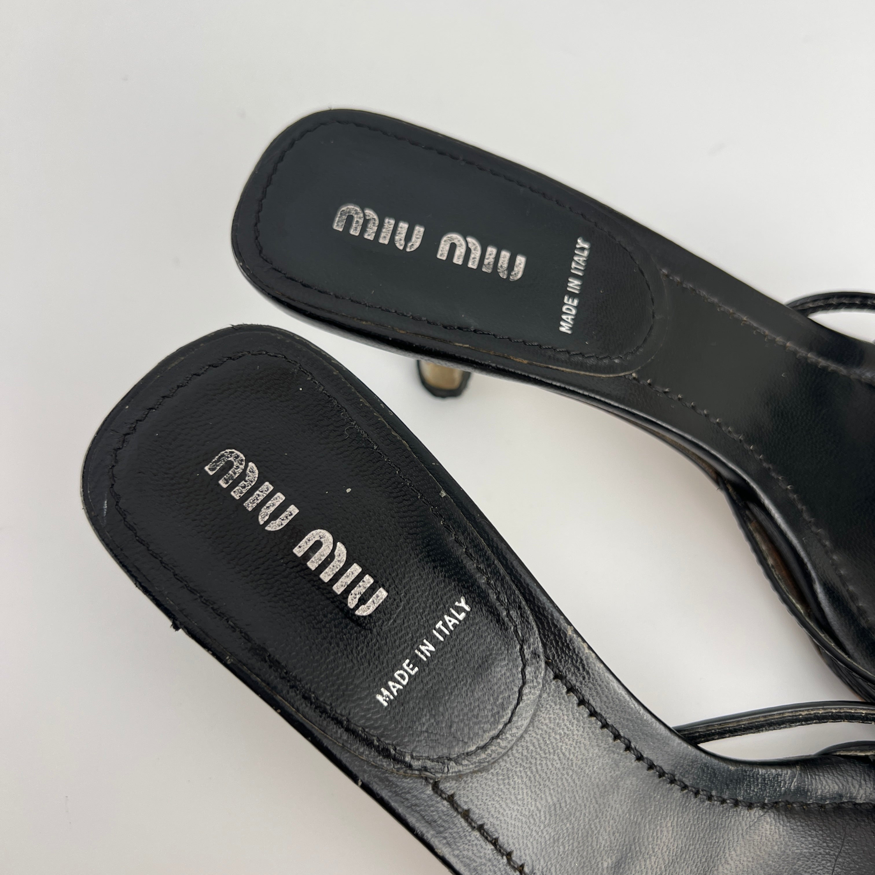 Miu Miu | Black Leather Cross Strap Kitten Heel Slide Mules (38)
