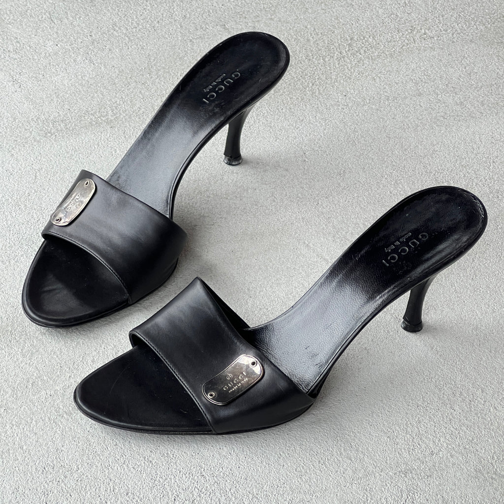 Gucci | Vintage Black Leather Silver Logo Dog Tag Slide Mules (37.5)