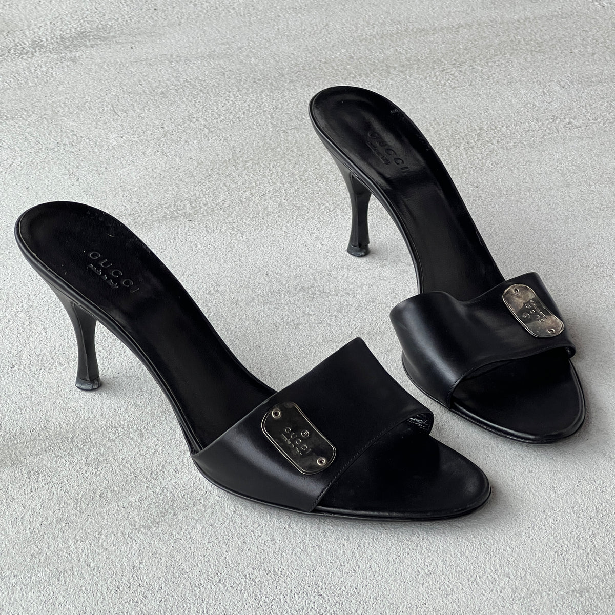 Gucci | Vintage Black Leather Silver Logo Dog Tag Slide Mules (37.5)