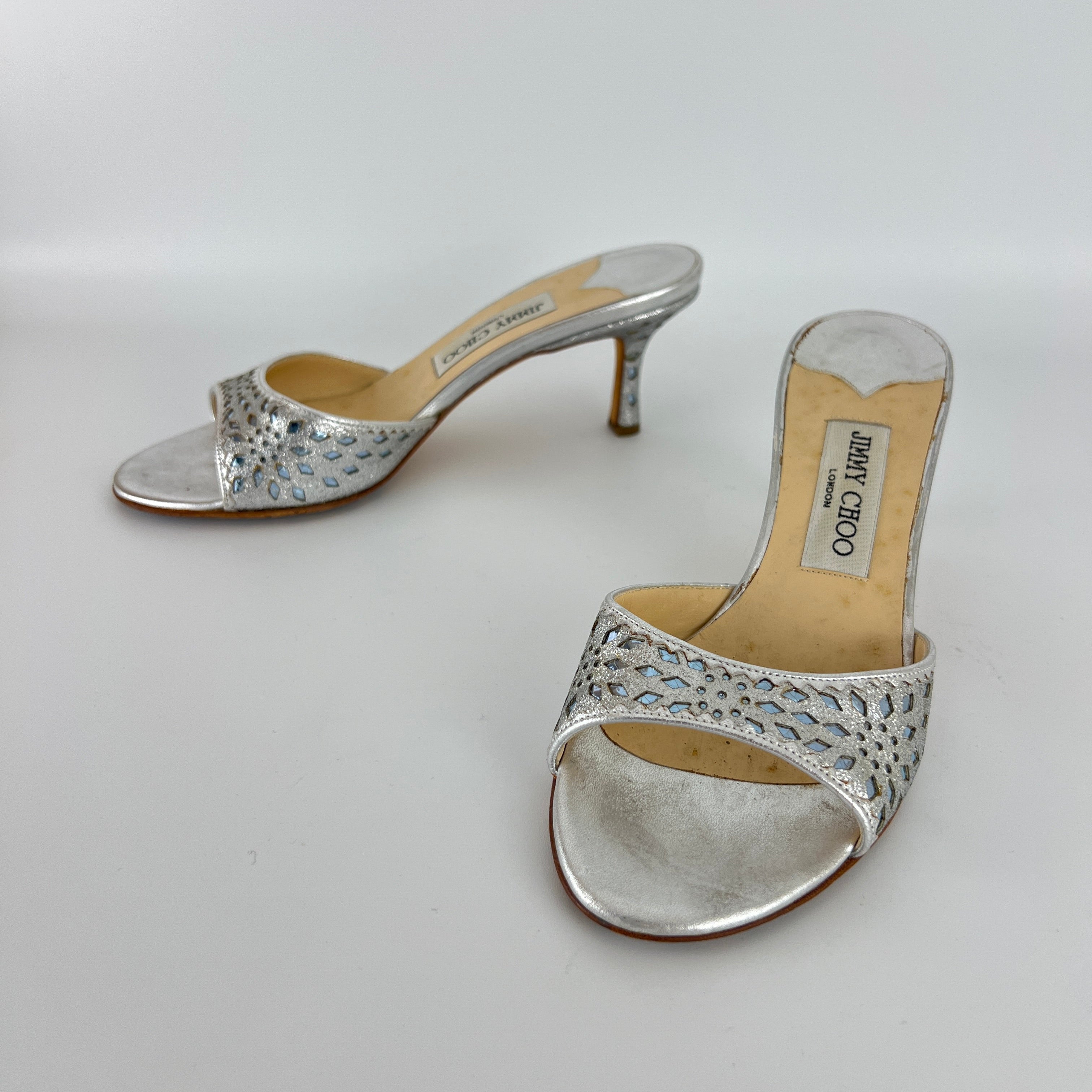 Jimmy Choo | Metallic Silver Leather Ice Blue Geometric Cut Out Slide Mules (36.5)