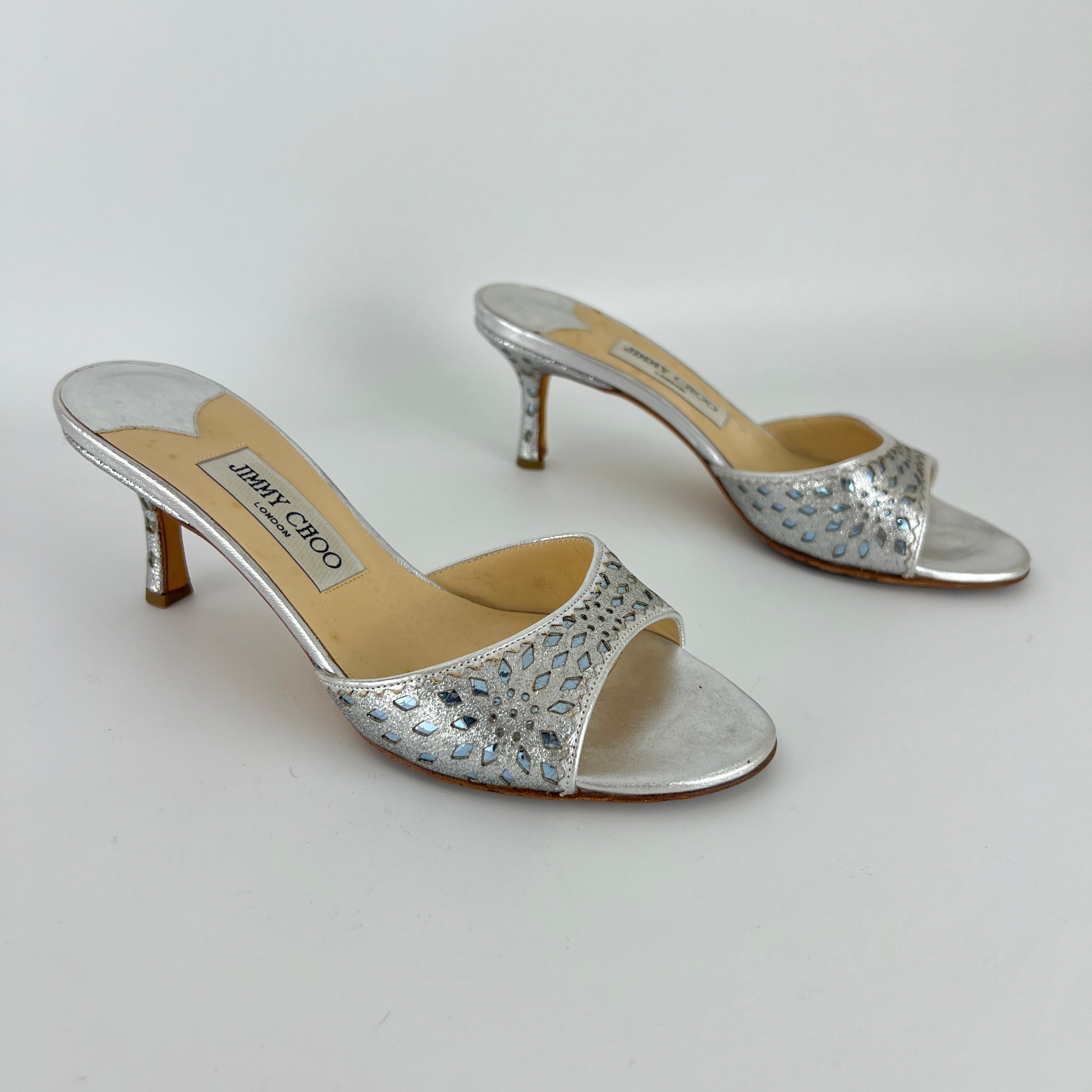 Jimmy Choo | Metallic Silver Leather Ice Blue Geometric Cut Out Slide Mules (36.5)