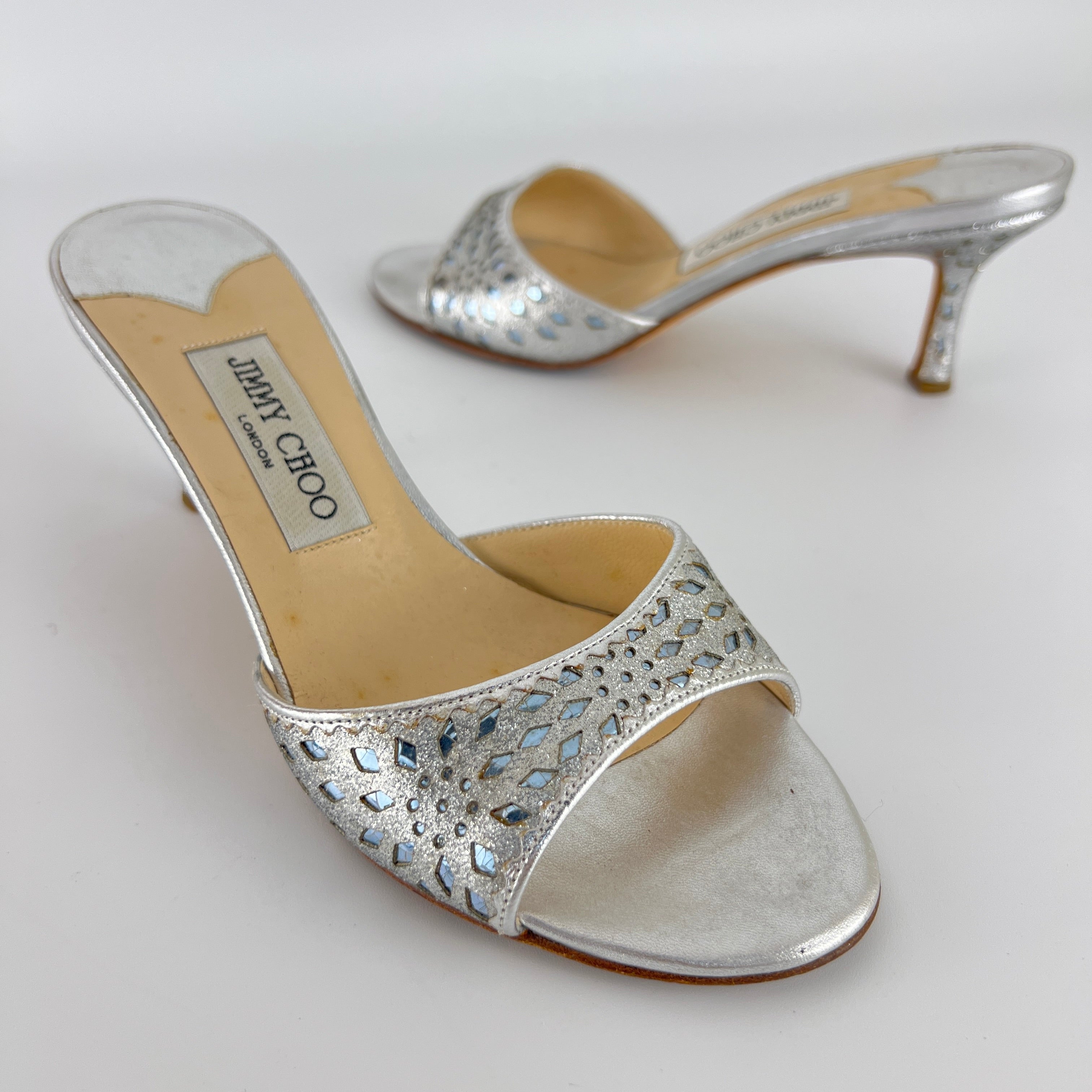 Jimmy Choo | Metallic Silver Leather Ice Blue Geometric Cut Out Slide Mules (36.5)