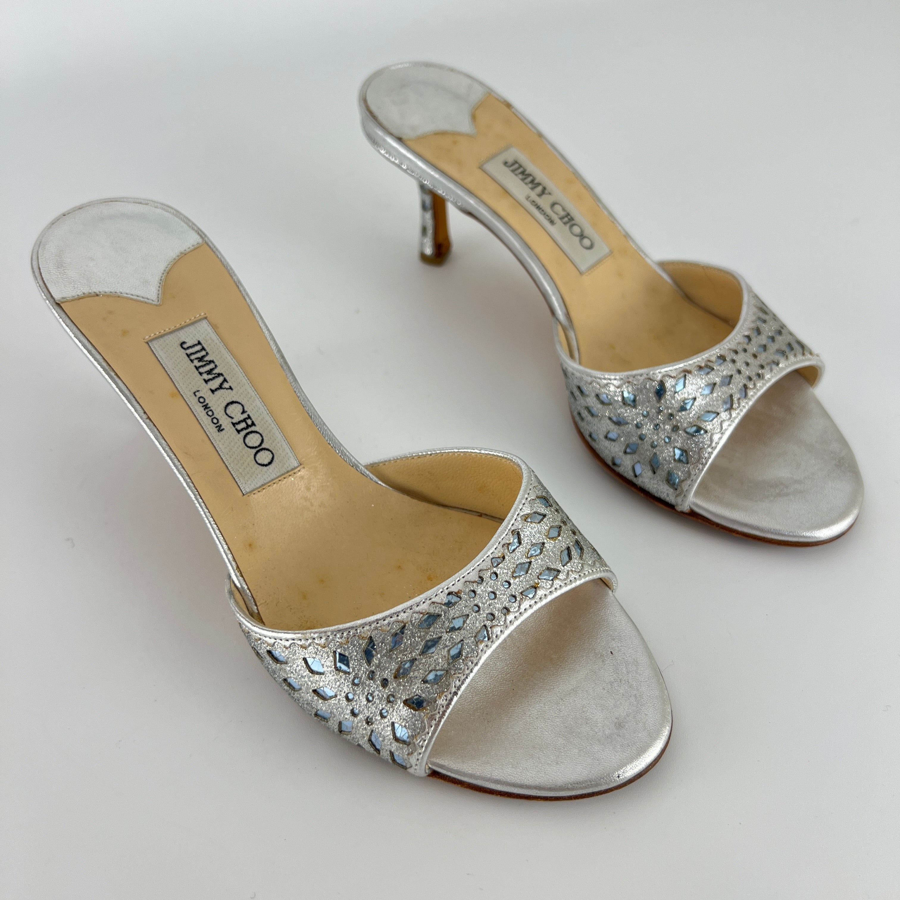 Jimmy Choo | Metallic Silver Leather Ice Blue Geometric Cut Out Slide Mules (36.5)