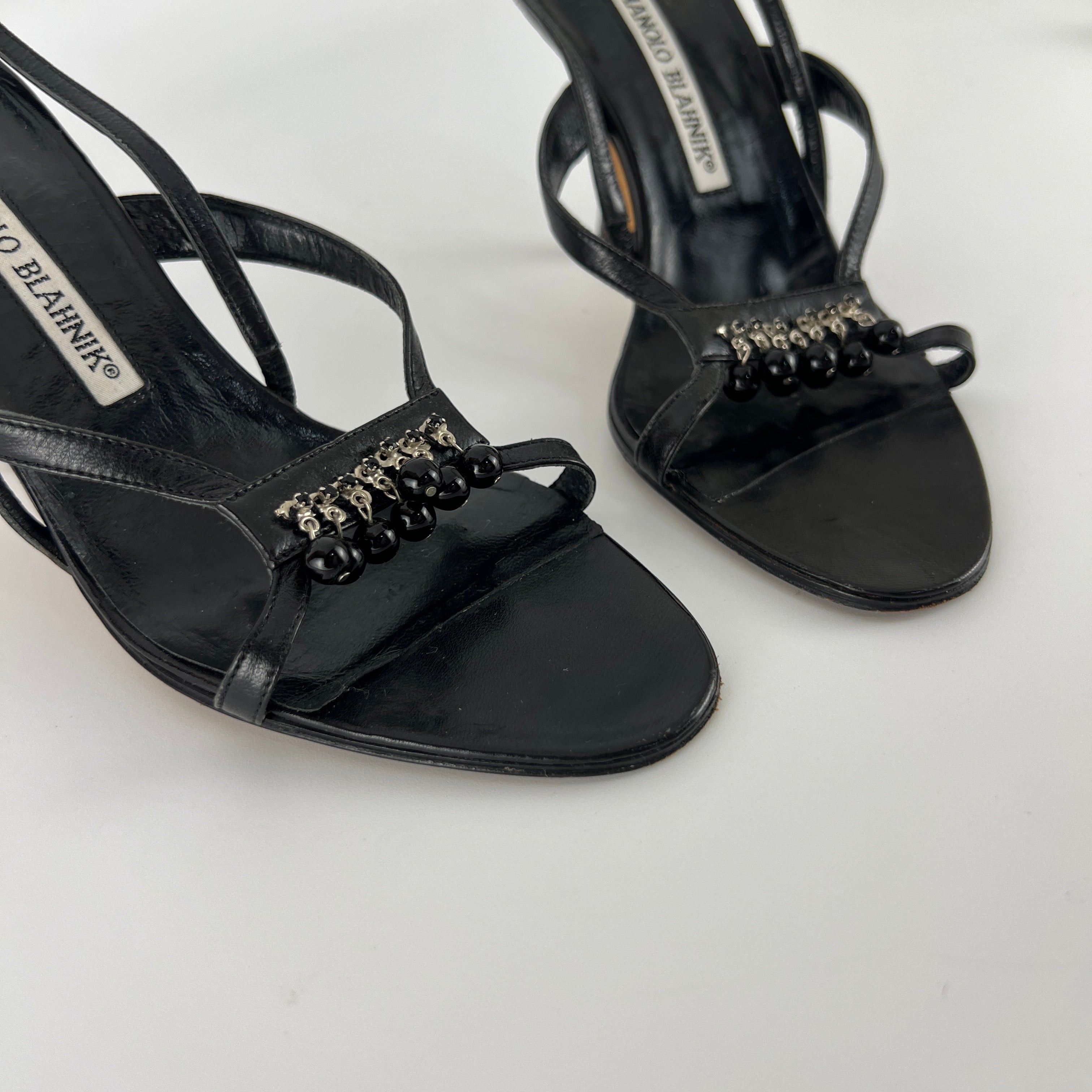 Manolo Blahnik | Black Leather Beaded Tassel Strappy Sandal Heels (35.5)