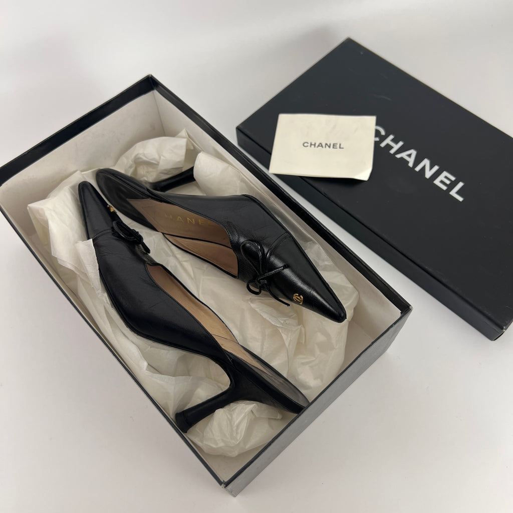 Chanel | Vintage Black Leather CC Logo Bow Pointed Toe Slide Mules (37.5)