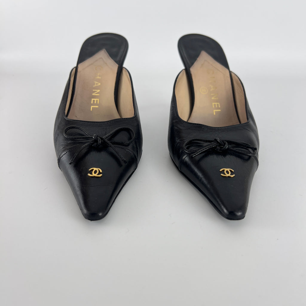Chanel | Vintage Black Leather CC Logo Bow Pointed Toe Slide Mules (37.5)