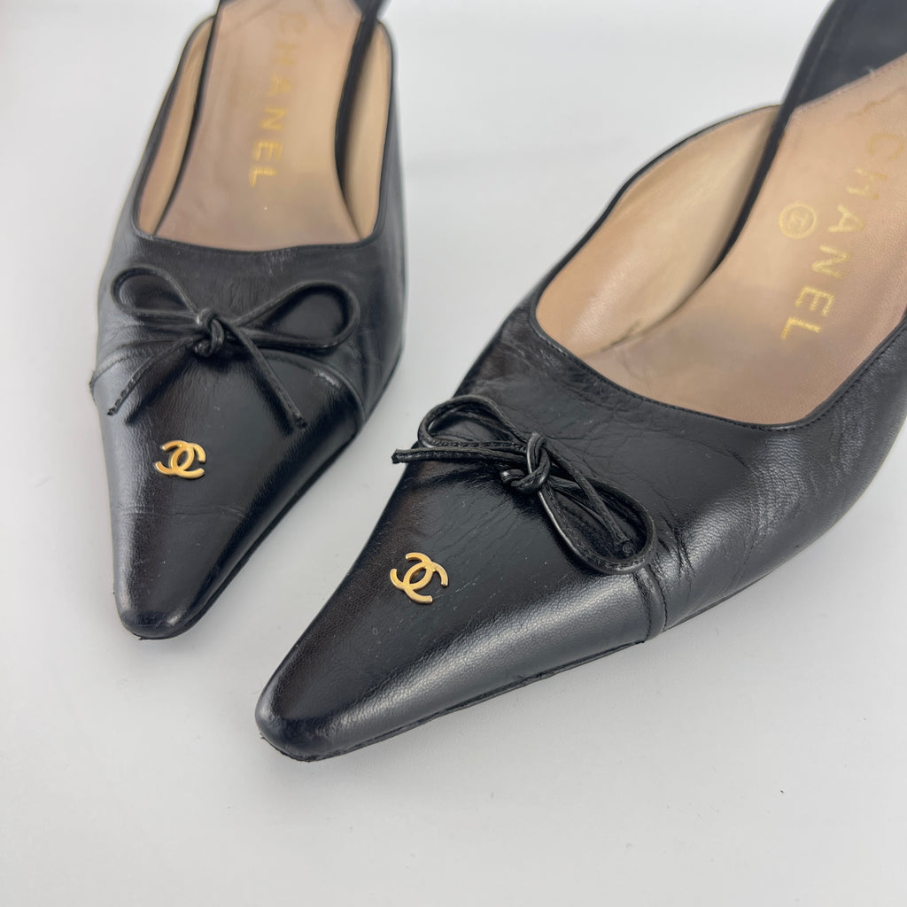 Chanel | Vintage Black Leather CC Logo Bow Pointed Toe Slide Mules (37.5)