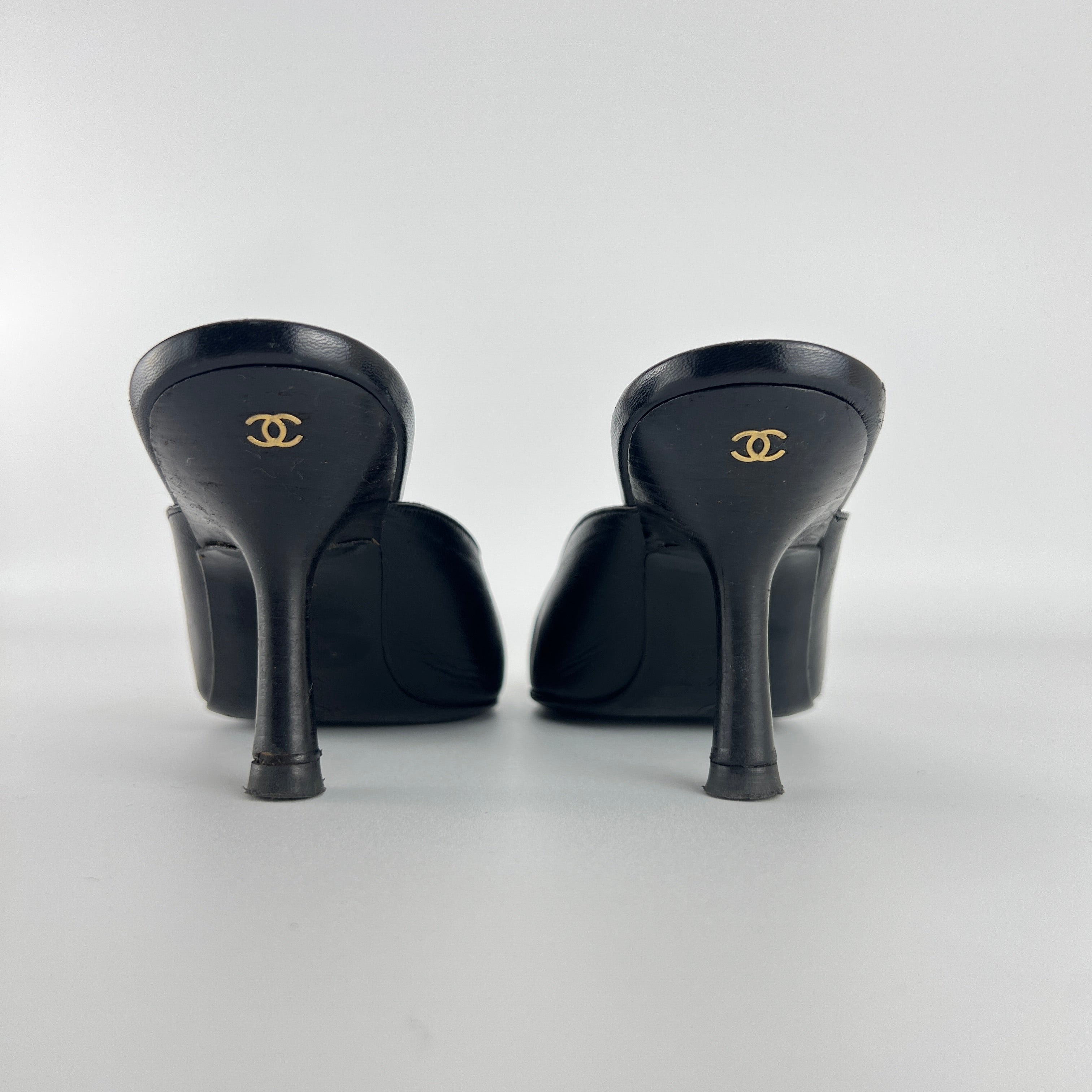 Chanel | Vintage Black Leather CC Logo Bow Pointed Toe Slide Mules (37.5)
