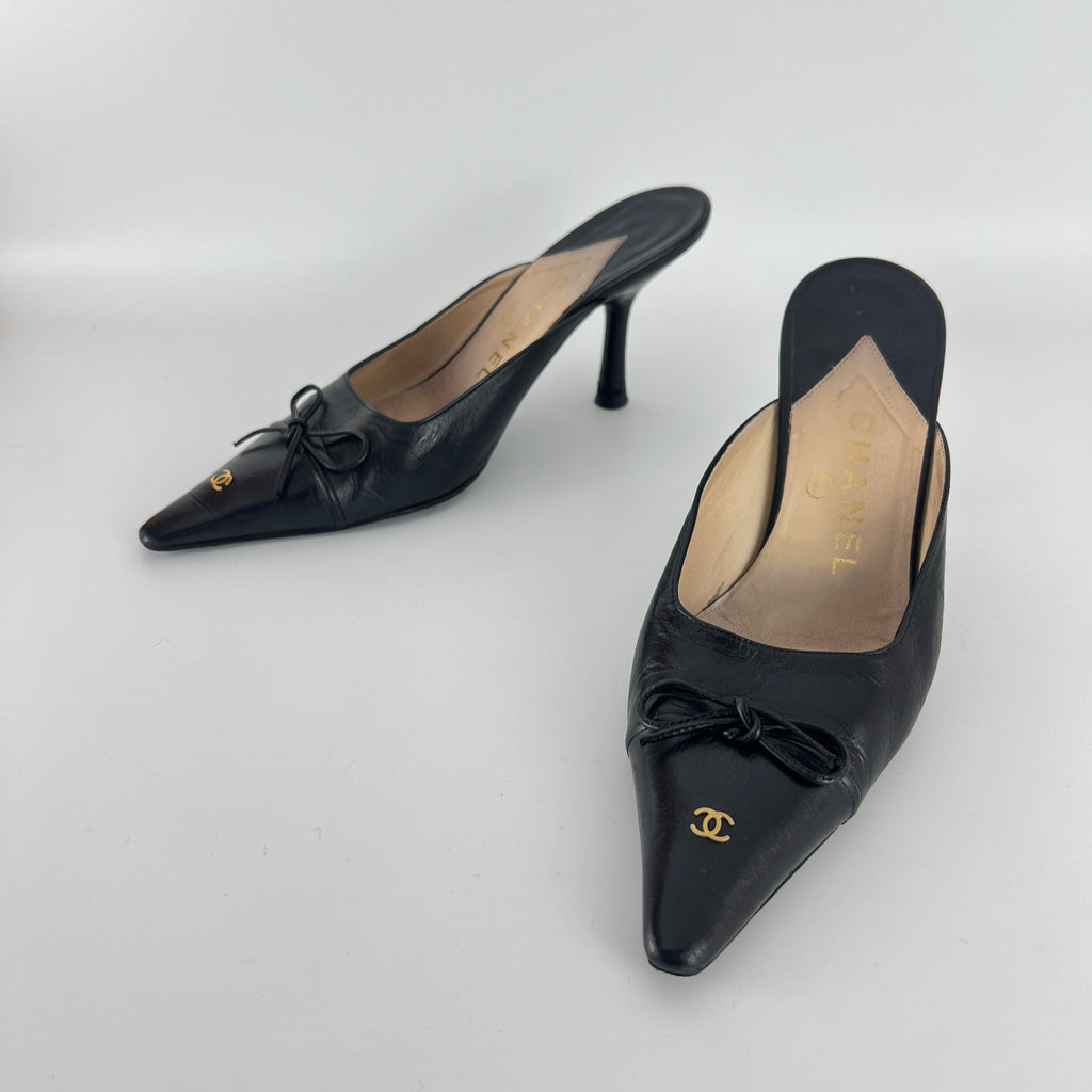Chanel | Vintage Black Leather CC Logo Bow Pointed Toe Slide Mules (37.5)