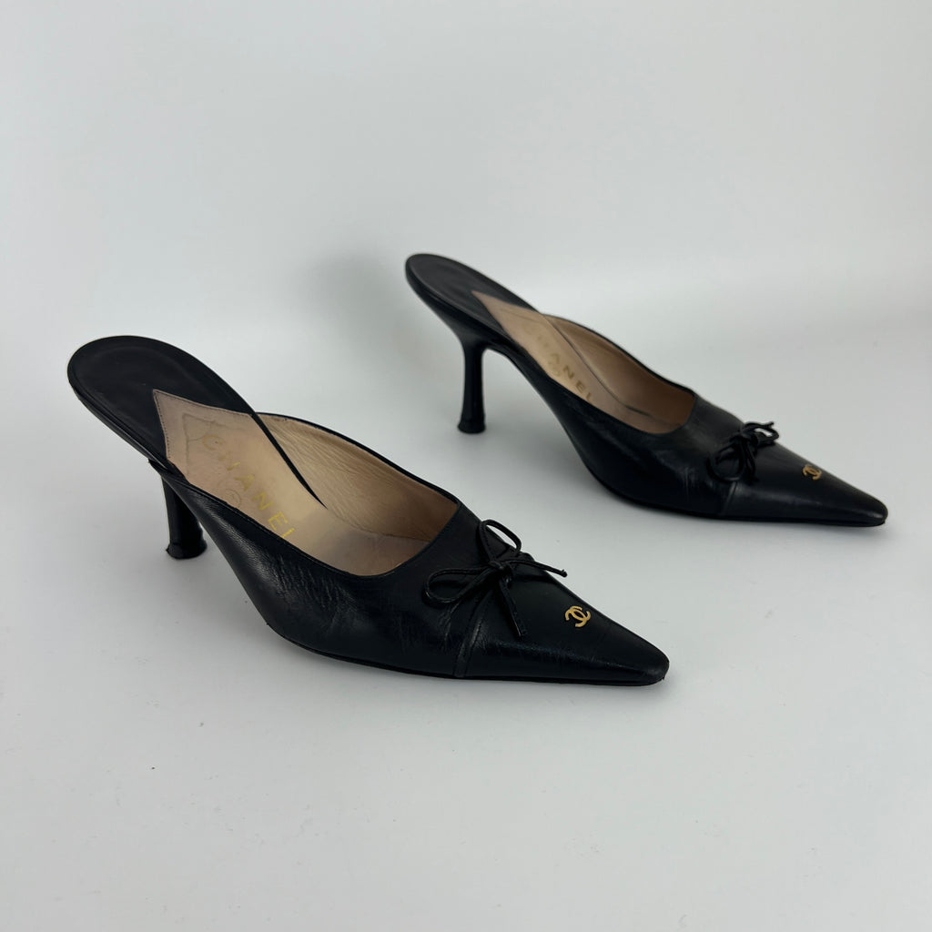 Chanel | Vintage Black Leather CC Logo Bow Pointed Toe Slide Mules (37.5)