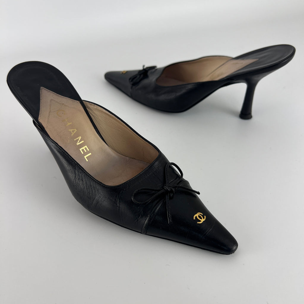 Chanel | Vintage Black Leather CC Logo Bow Pointed Toe Slide Mules (37.5)