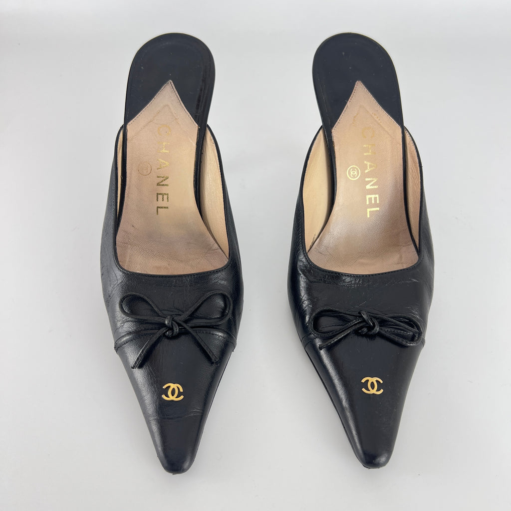 Chanel | Vintage Black Leather CC Logo Bow Pointed Toe Slide Mules (37.5)