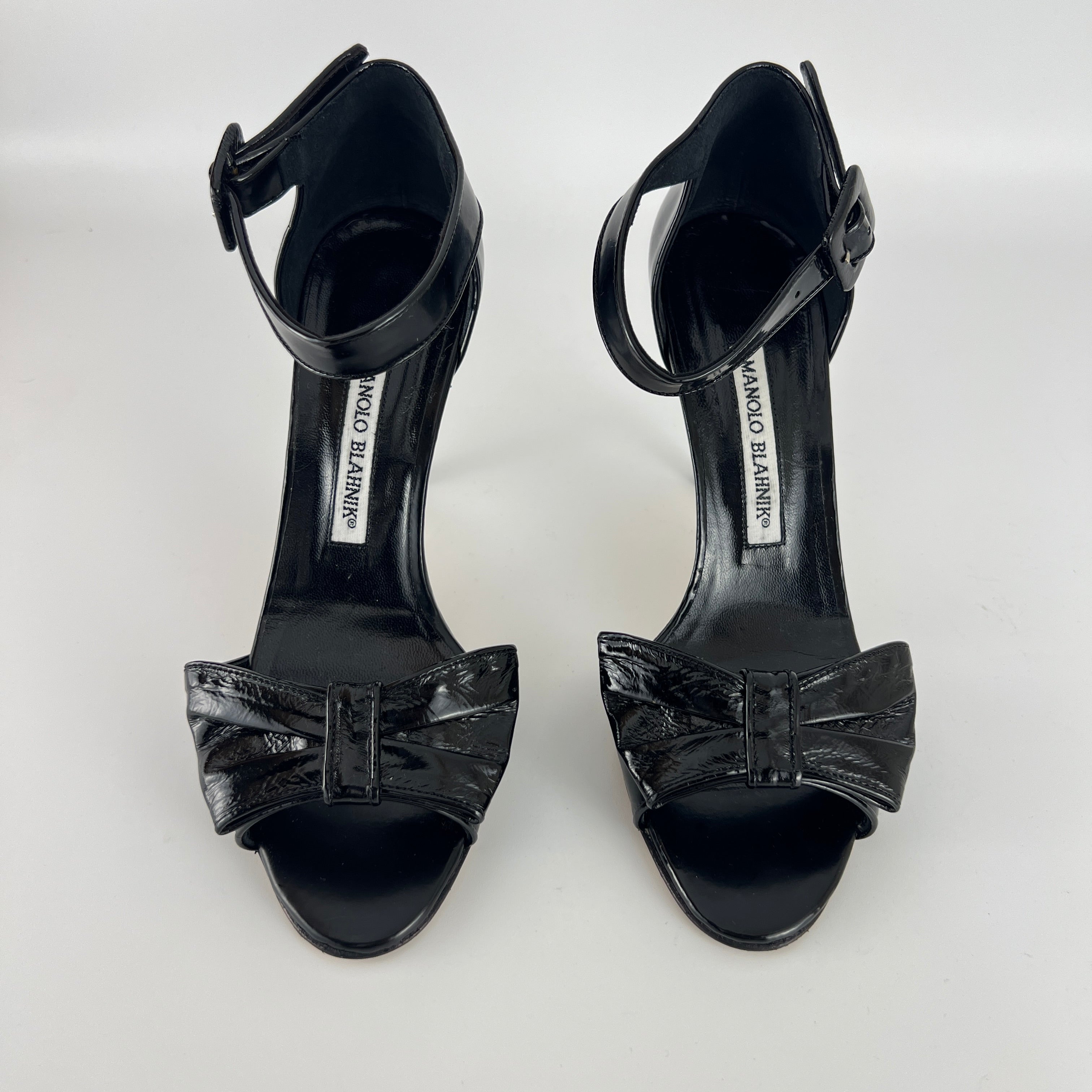 Manolo Blahnik | Black Patent Leather Bow Ankle Wrap Sandal Heels (36.5)