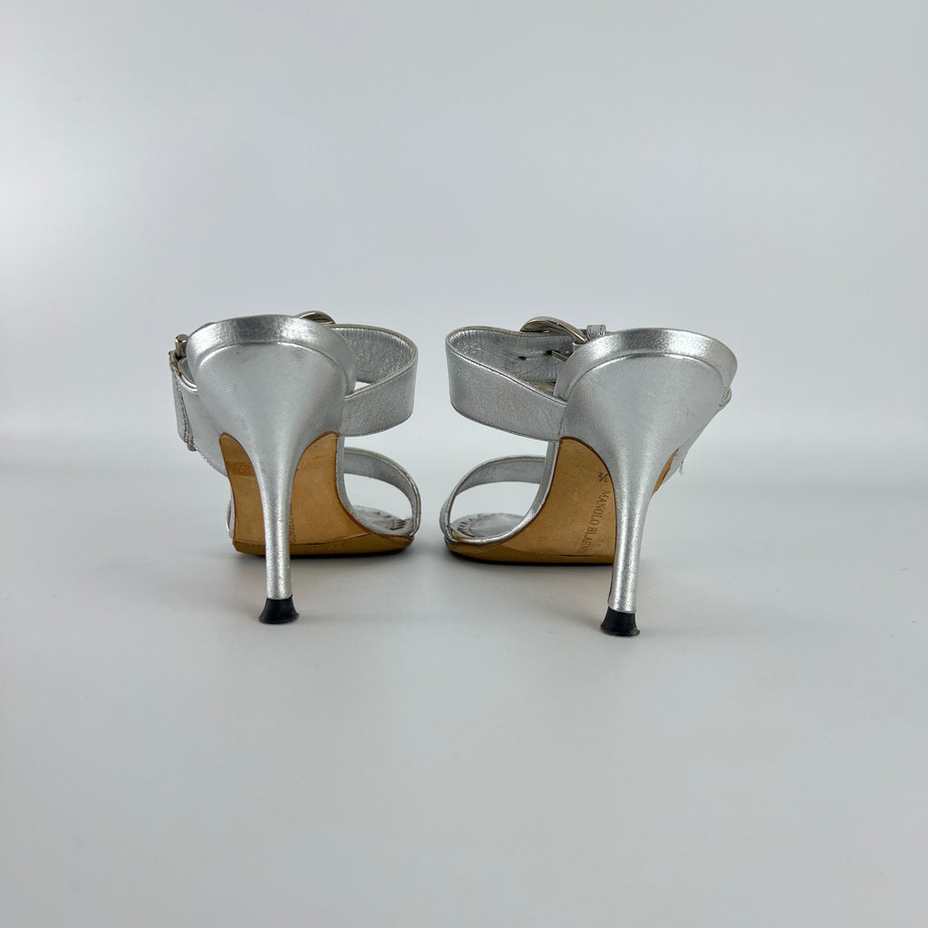 Manolo Blahnik | Metallic Silver Buckle Horsebit Detail Dual Strap Mules (34.5)