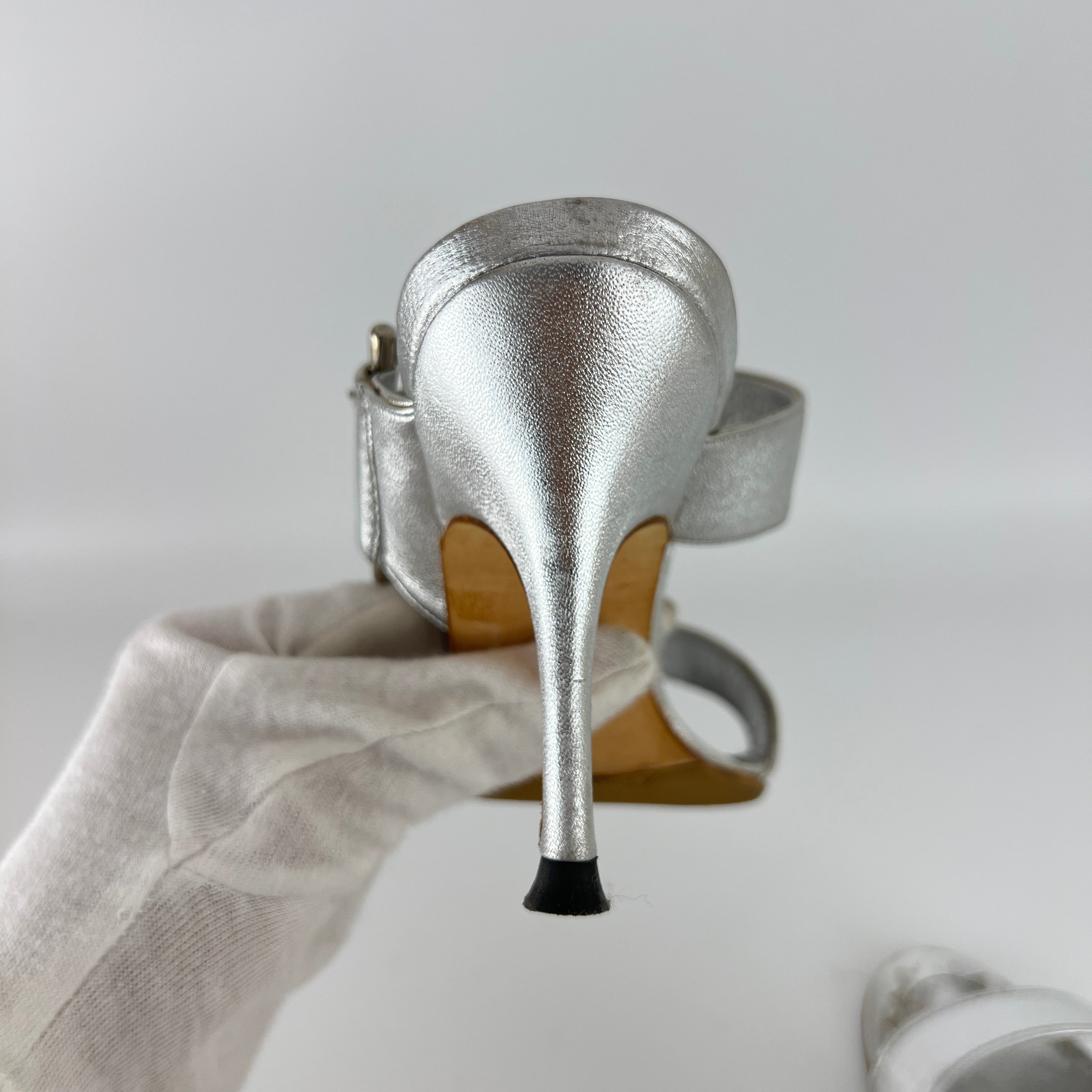 Manolo Blahnik | Metallic Silver Buckle Horsebit Detail Dual Strap Mules (34.5)