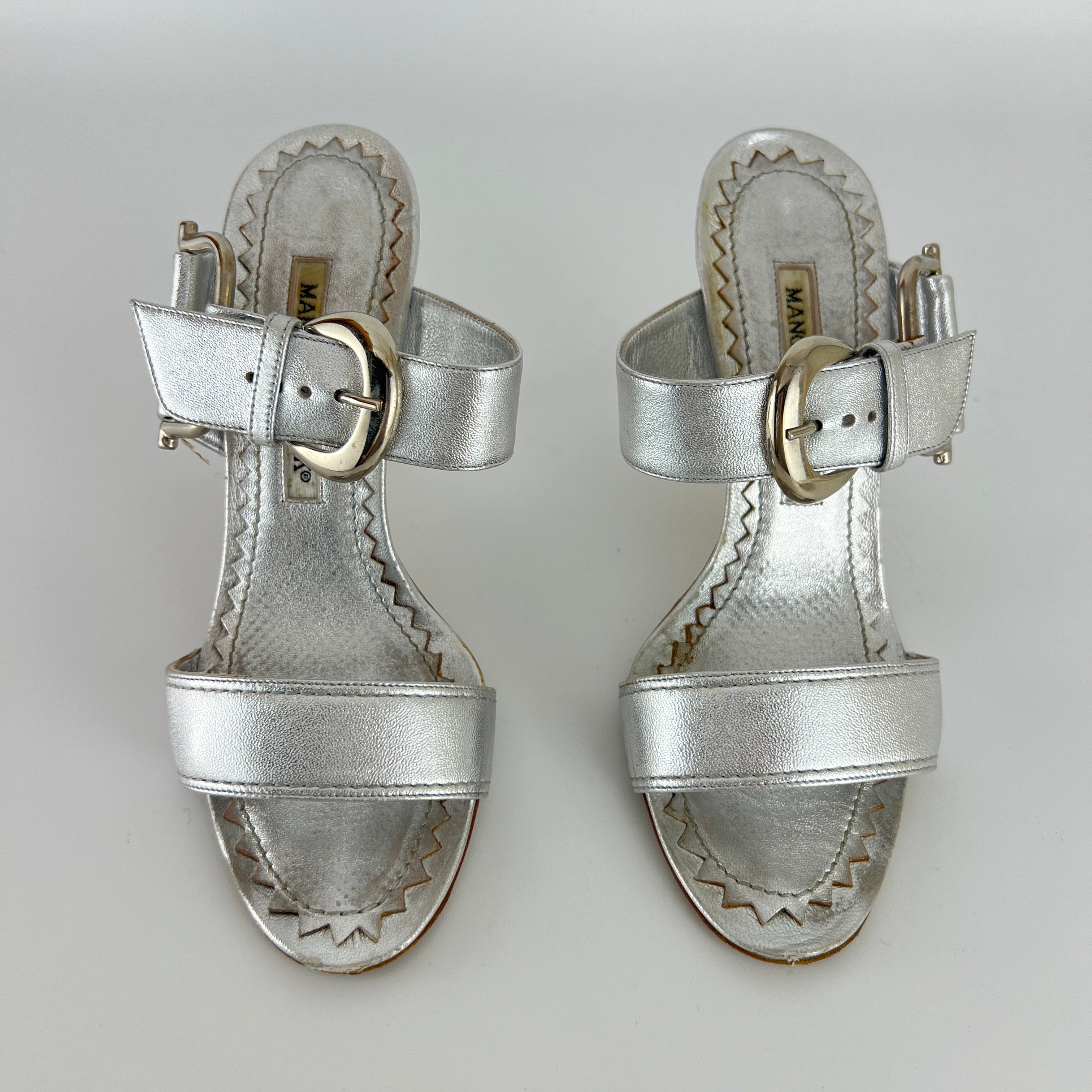 Manolo Blahnik | Metallic Silver Buckle Horsebit Detail Dual Strap Mules (34.5)