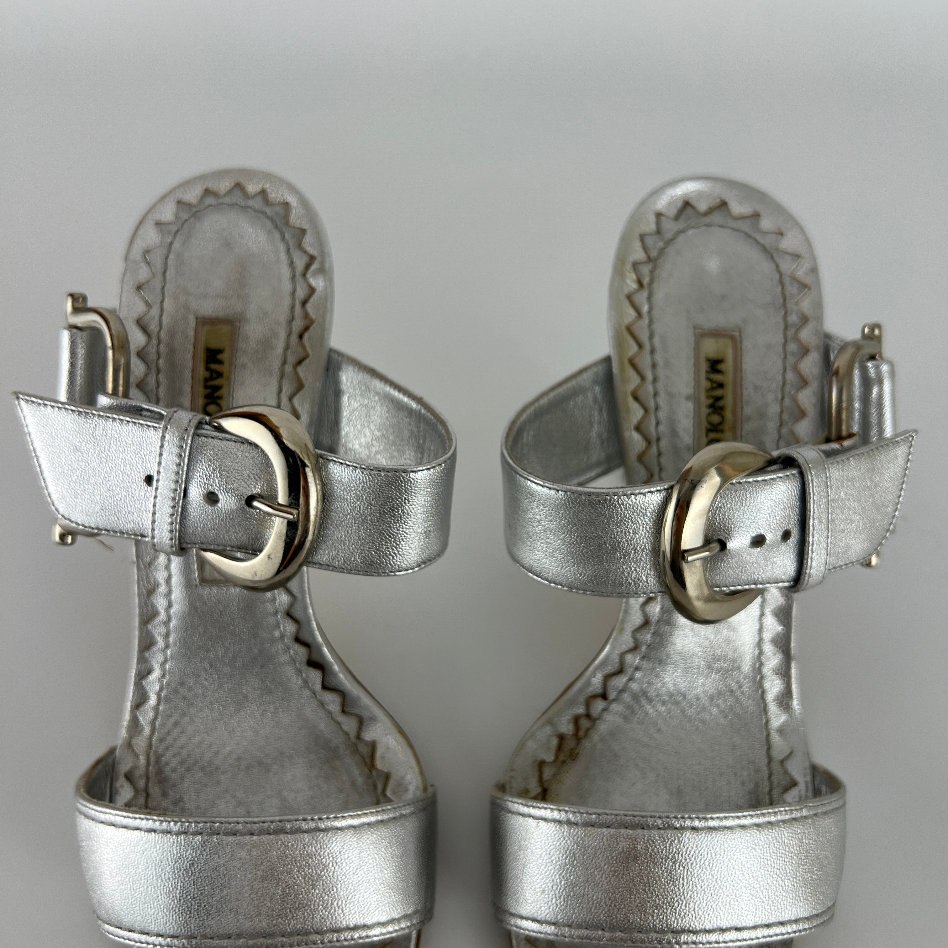 Manolo Blahnik | Metallic Silver Buckle Horsebit Detail Dual Strap Mules (34.5)