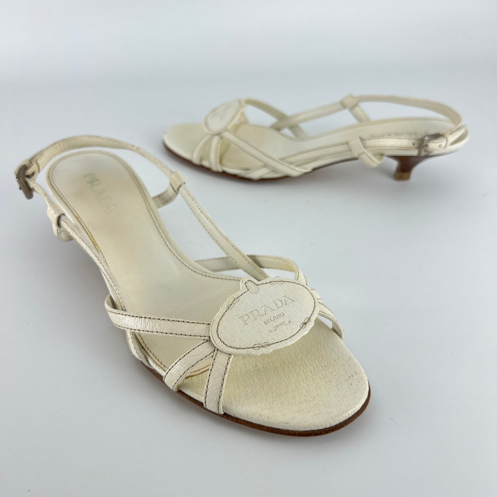Prada | Vintage White Leather Logo Plate Kitten Heel Sandals (37.5)