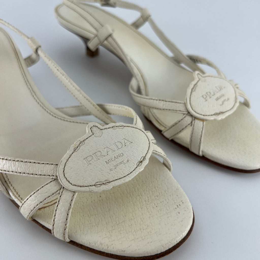 Prada | Vintage White Leather Logo Plate Kitten Heel Sandals (37.5)
