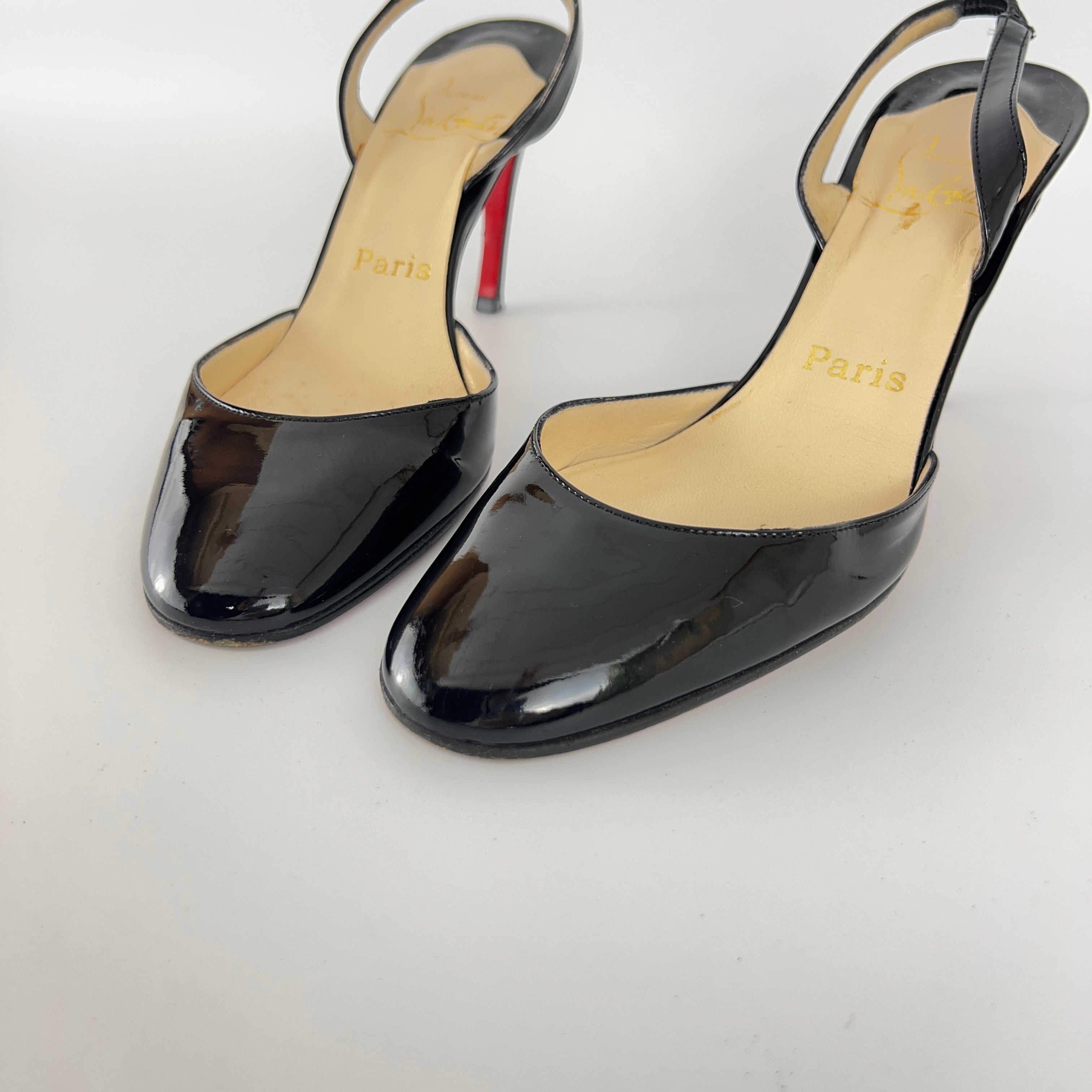 Louboutin | Black Patent Leather Round Toe Slingback Stiletto Heels (35.5)