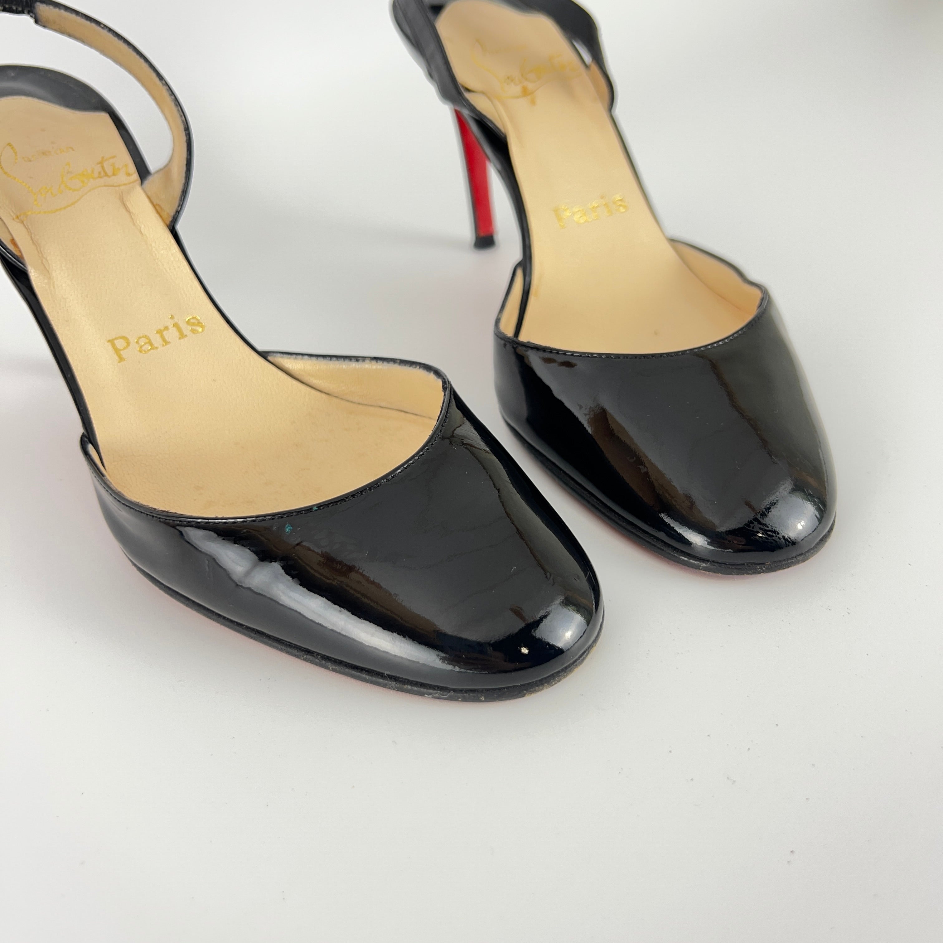 Louboutin | Black Patent Leather Round Toe Slingback Stiletto Heels (35.5)