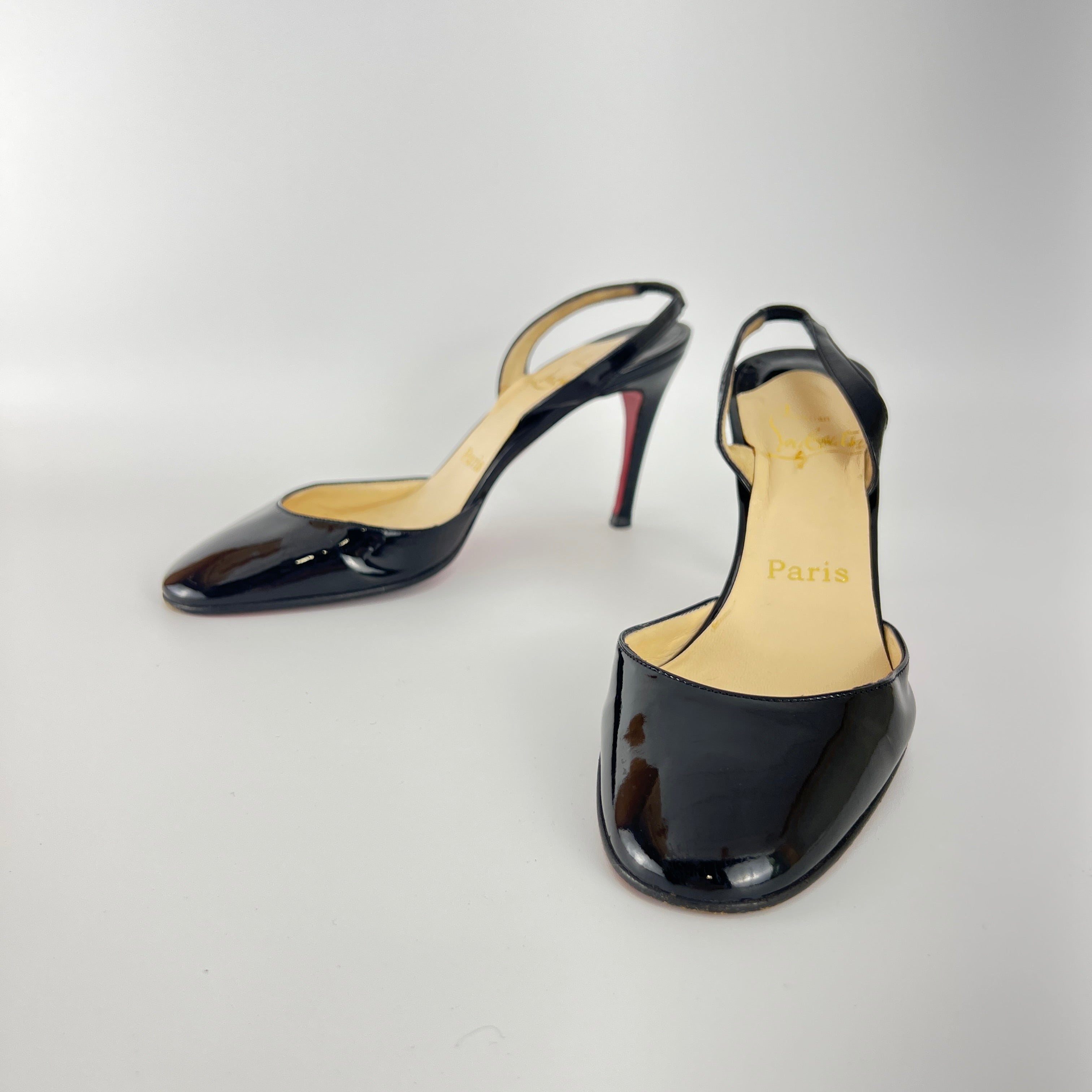Louboutin | Black Patent Leather Round Toe Slingback Stiletto Heels (35.5)