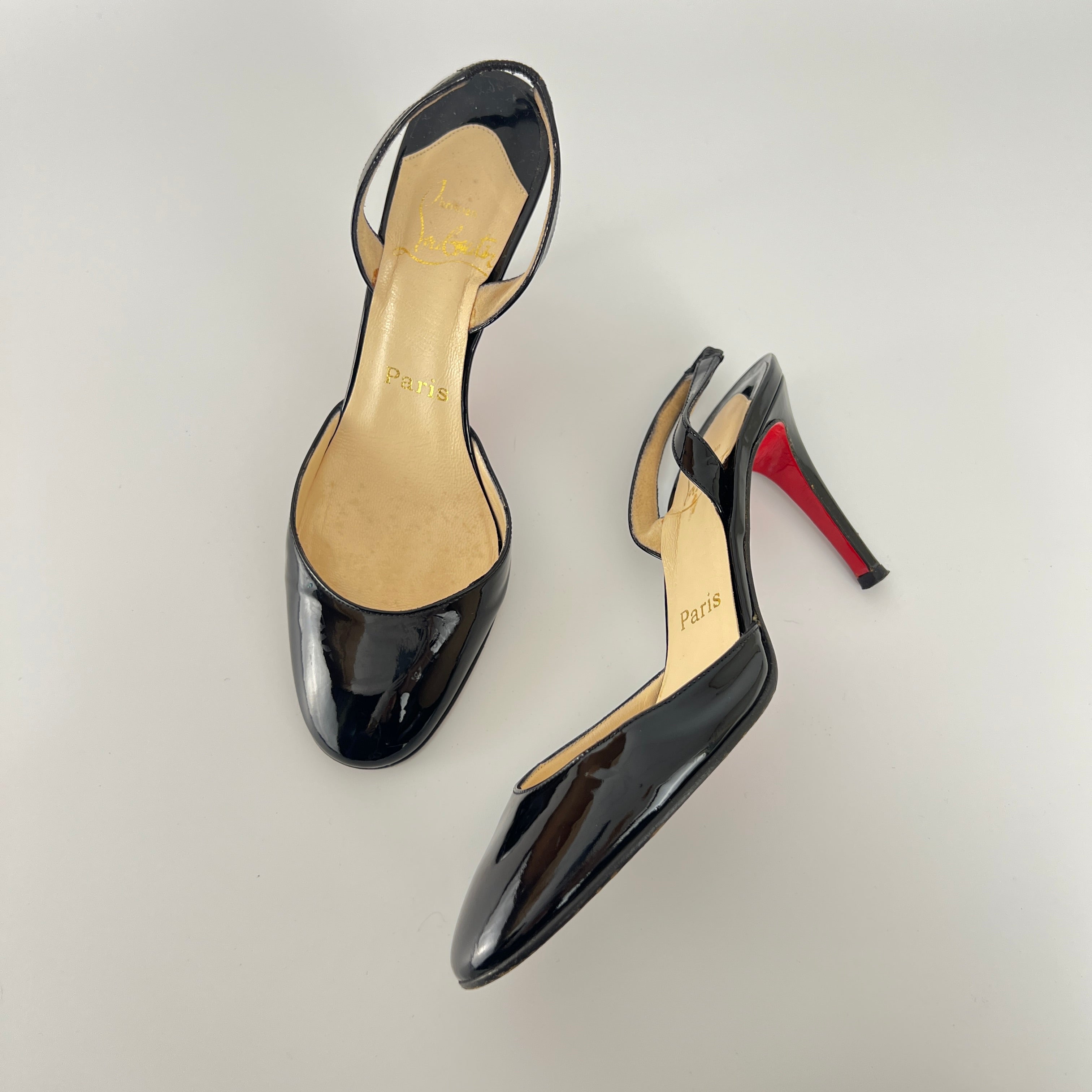 Louboutin | Black Patent Leather Round Toe Slingback Stiletto Heels (35.5)