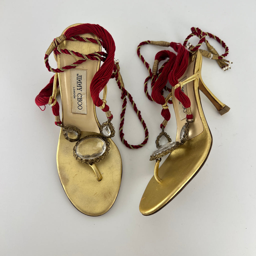 Jimmy Choo | Gold Metallic Leather Clear Gem Red Tassel Lace Up Thong Heels (37)
