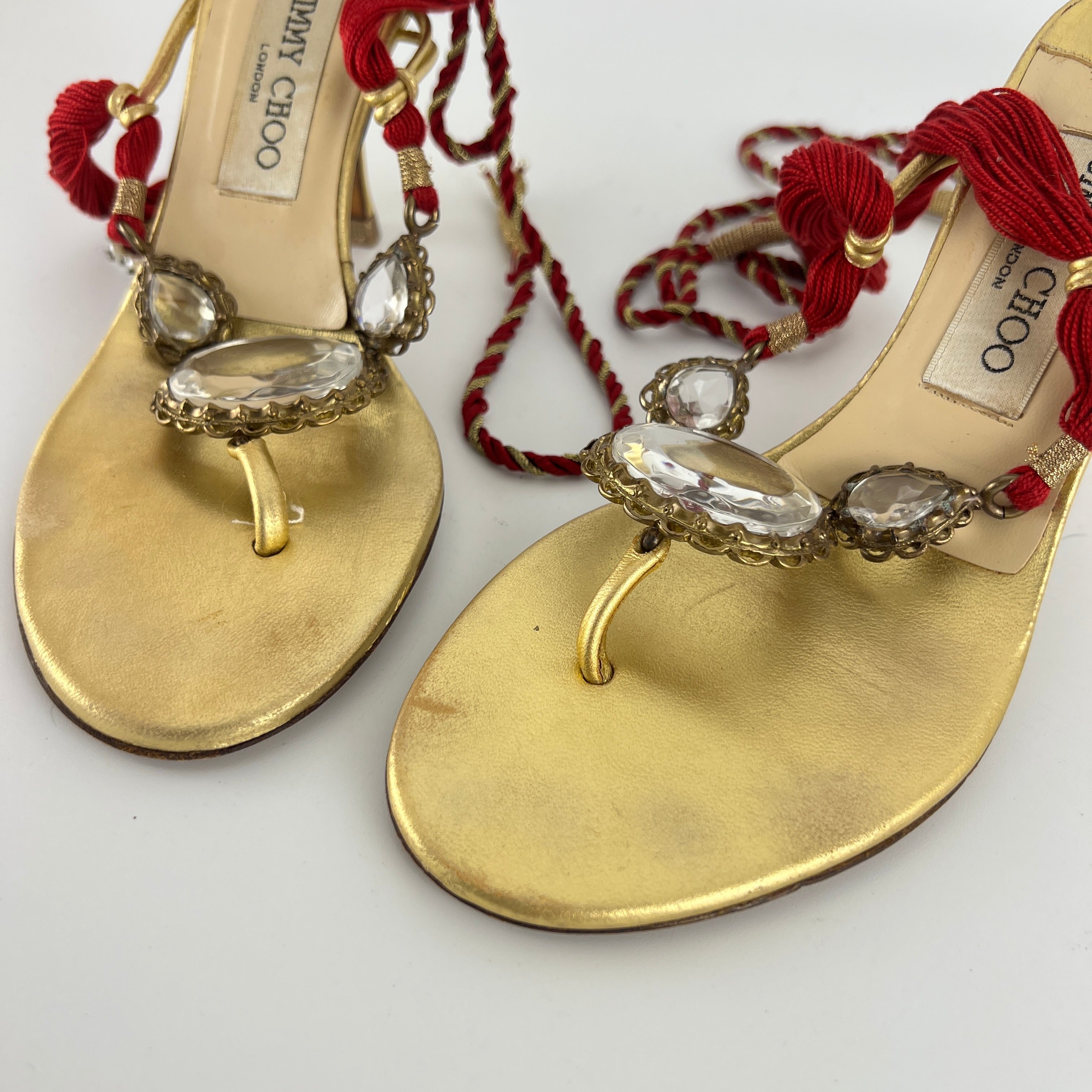 Jimmy Choo | Gold Metallic Leather Clear Gem Red Tassel Lace Up Thong Heels (37)
