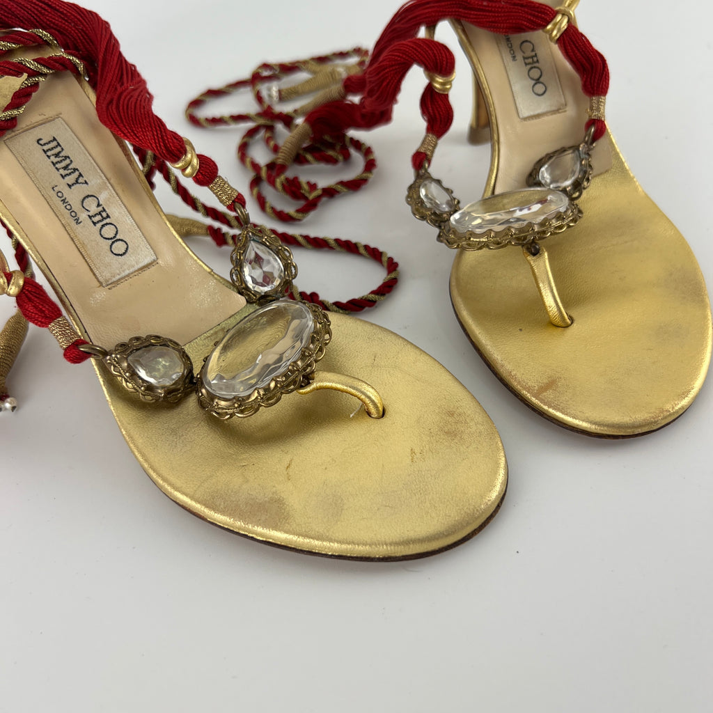 Jimmy Choo | Gold Metallic Leather Clear Gem Red Tassel Lace Up Thong Heels (37)