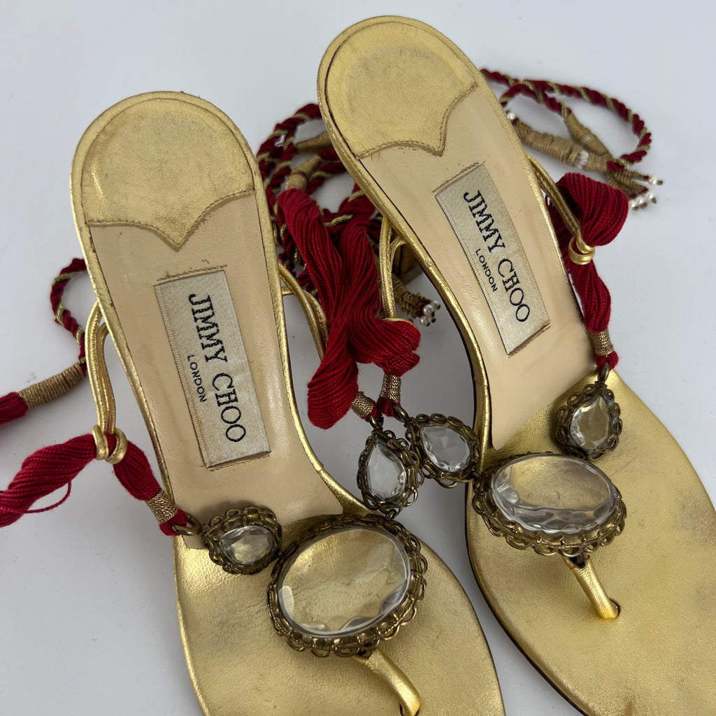 Jimmy Choo | Gold Metallic Leather Clear Gem Red Tassel Lace Up Thong Heels (37)