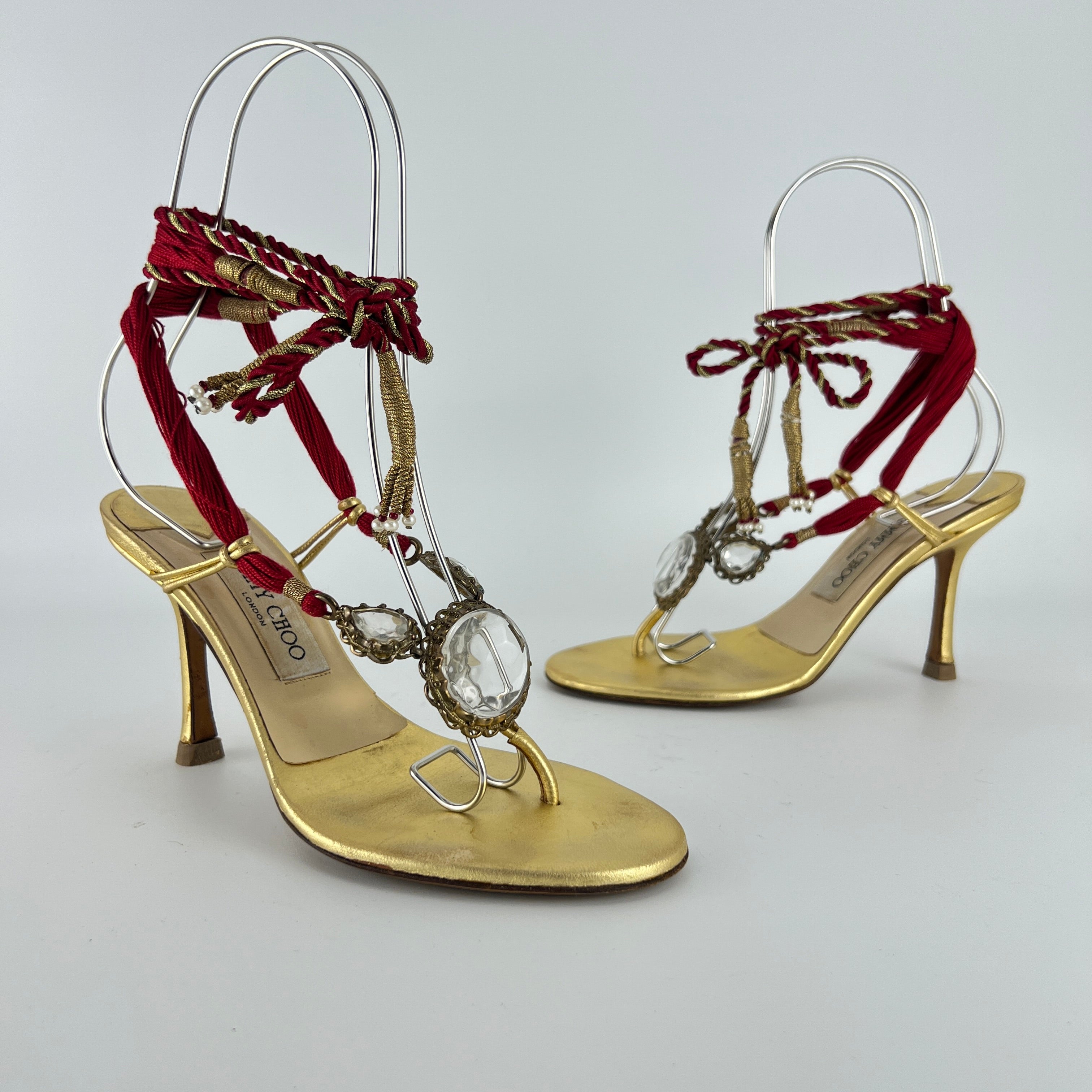 Jimmy Choo | Gold Metallic Leather Clear Gem Red Tassel Lace Up Thong Heels (37)
