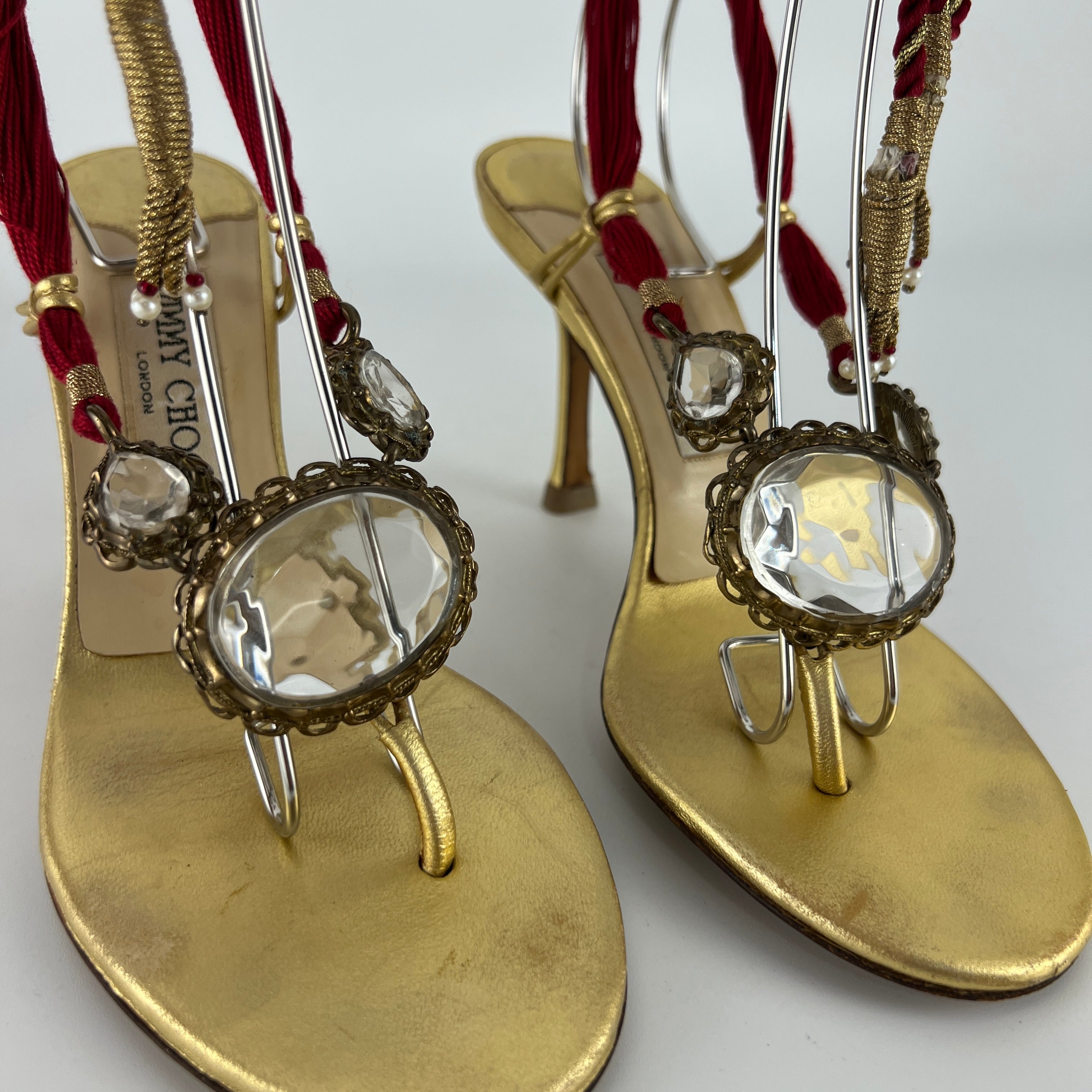 Jimmy Choo | Gold Metallic Leather Clear Gem Red Tassel Lace Up Thong Heels (37)
