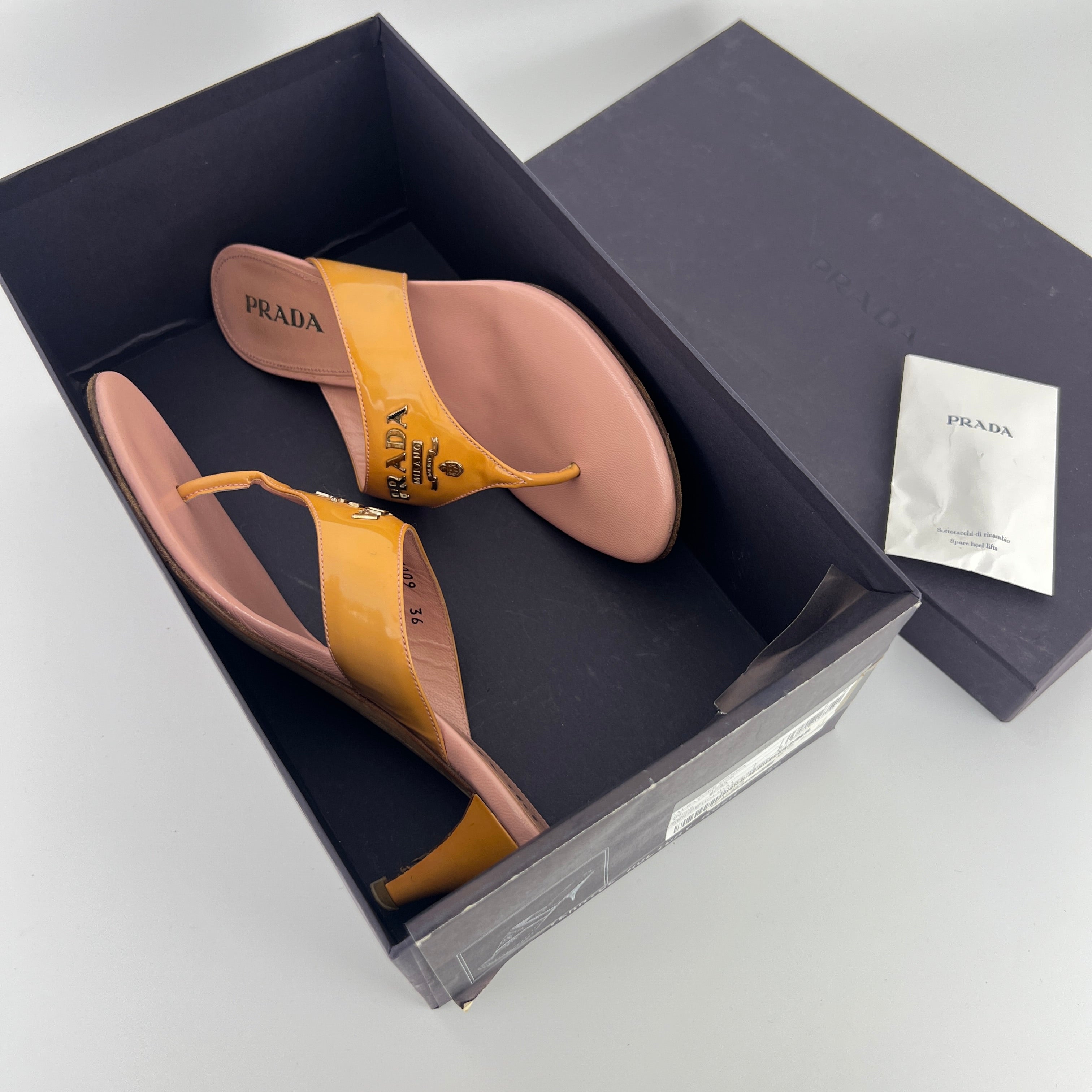 Prada | Vintage Y2K Holiday Rosa Orange Patent Leather Logo Thong Kitten Mules (36)