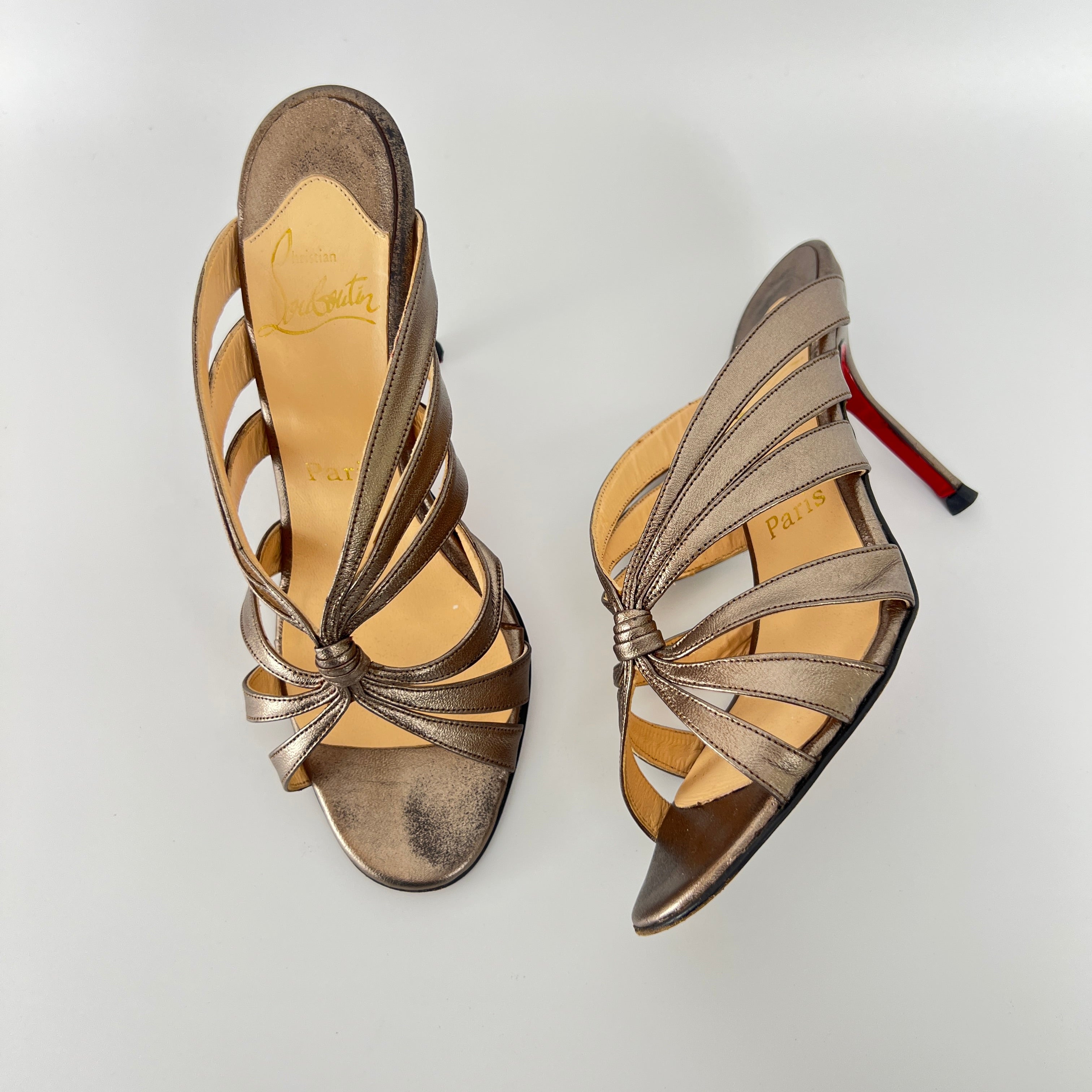 Louboutin | Rose Gold Metallic Leather Twist Strappy Sandal Mule Heels (36)